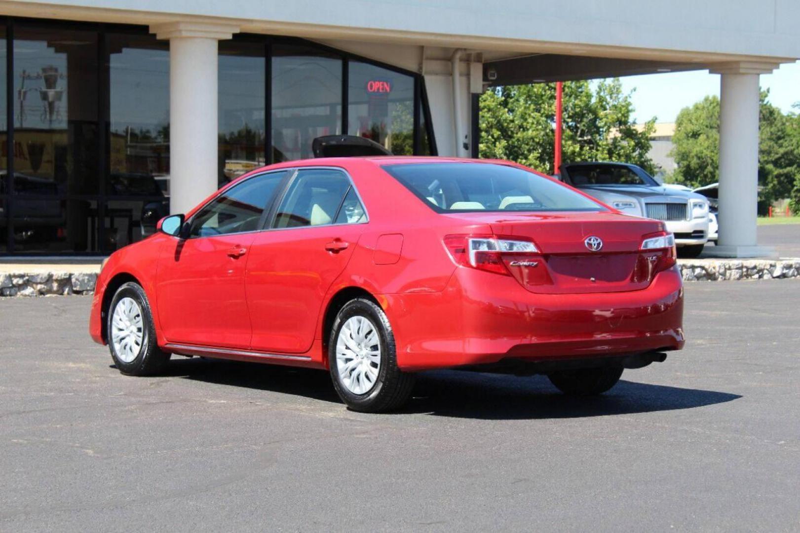 2014 Red Toyota Camry L (4T4BF1FK3ER) with an 2.5L L4 DOHC 16V engine, 6-Speed Automatic transmission, located at 4301 NW 39th , Oklahoma City, OK, 73112, (405) 949-5600, 35.512135, -97.598671 - Photo#5