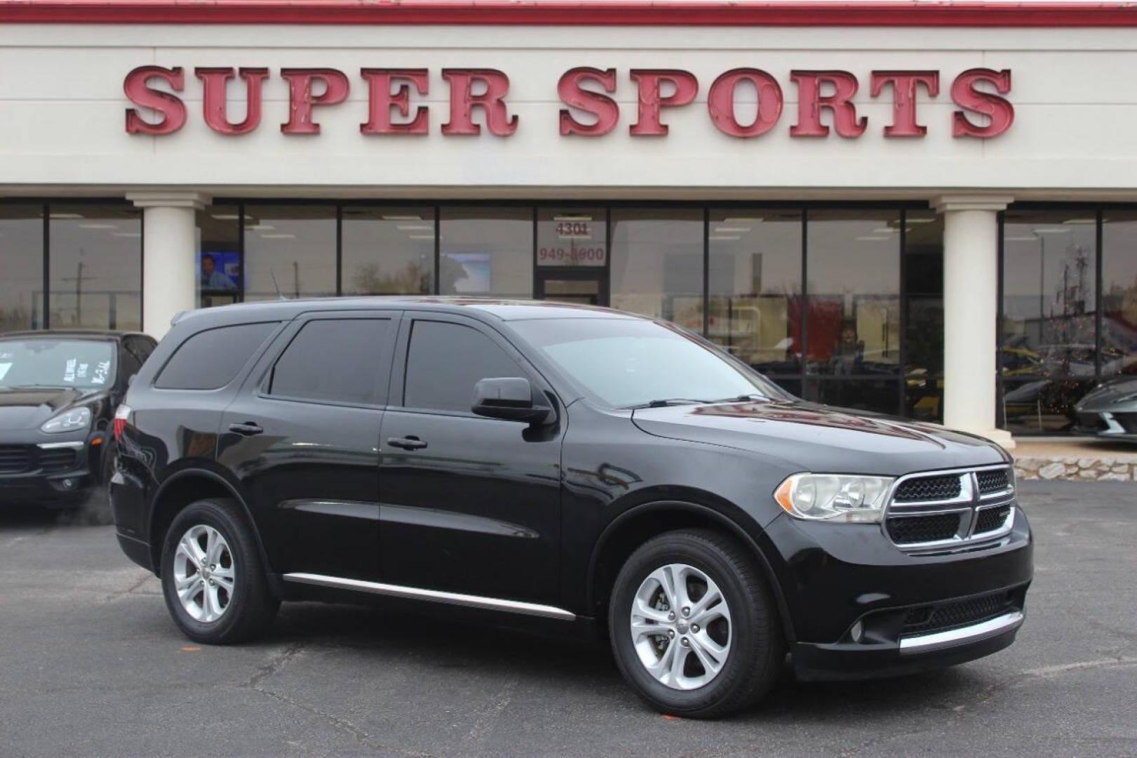 2013 Black Dodge Durango SXT RWD (1C4RDHAG7DC) with an 3.6L V6 DOHC 24V engine, 5-Speed Automatic transmission, located at 4301 NW 39th , Oklahoma City, OK, 73112, (405) 949-5600, 35.512135, -97.598671 - NO DRIVERS LICENCE NO-FULL COVERAGE INSURANCE-NO CREDIT CHECK. COME ON OVER TO SUPERSPORTS AND TAKE A LOOK AND TEST DRIVE PLEASE GIVE US A CALL AT (405) 949-5600. NO LICENSIA DE MANEJAR- NO SEGURO DE COBERTURA TOTAL- NO VERIFICACCION DE CREDITO. POR FAVOR VENGAN A SUPERSPORTS, E - Photo#18