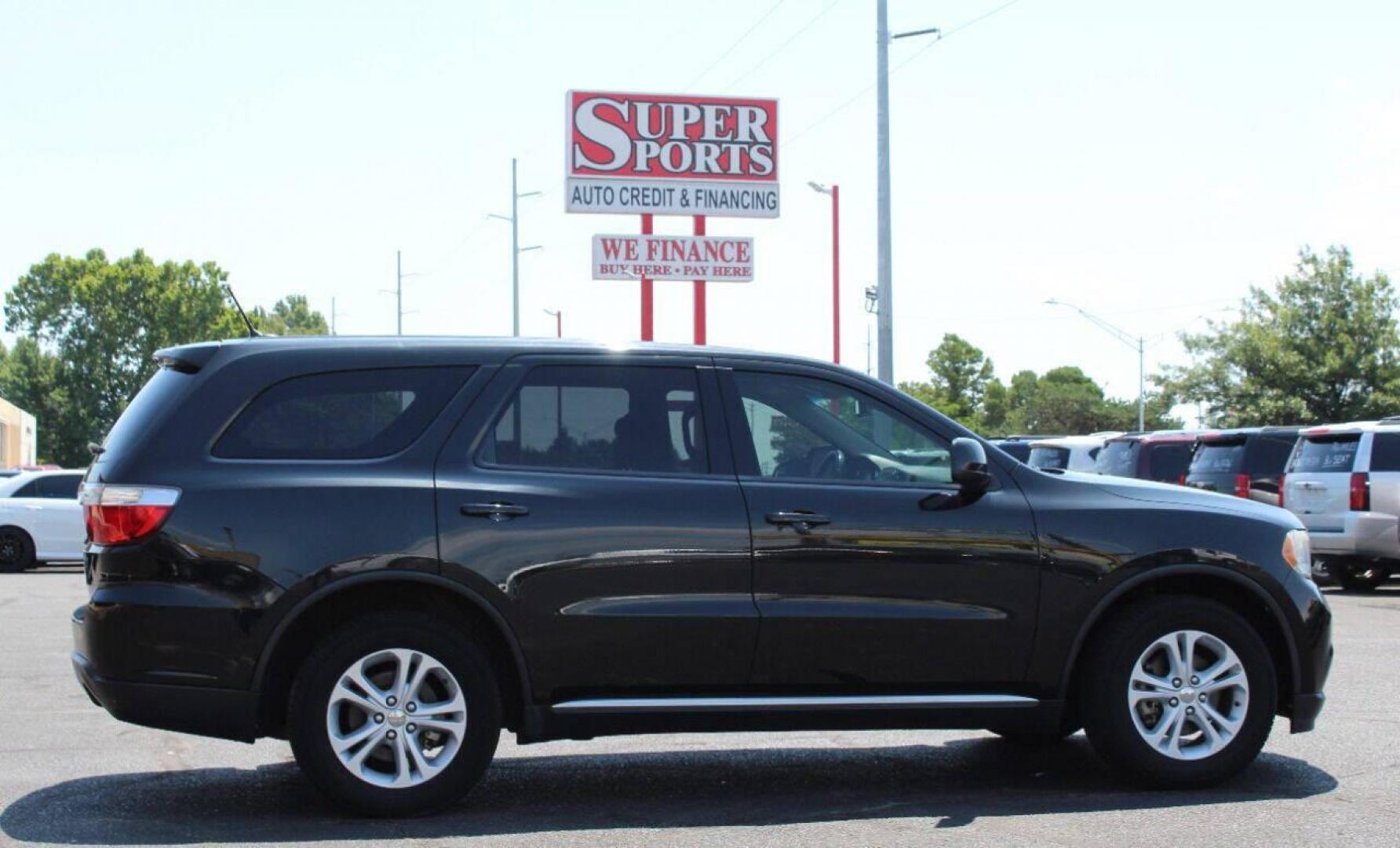 2013 Black Dodge Durango SXT RWD (1C4RDHAG7DC) with an 3.6L V6 DOHC 24V engine, 5-Speed Automatic transmission, located at 4301 NW 39th , Oklahoma City, OK, 73112, (405) 949-5600, 35.512135, -97.598671 - NO DRIVERS LICENCE NO-FULL COVERAGE INSURANCE-NO CREDIT CHECK. COME ON OVER TO SUPERSPORTS AND TAKE A LOOK AND TEST DRIVE PLEASE GIVE US A CALL AT (405) 949-5600. NO LICENSIA DE MANEJAR- NO SEGURO DE COBERTURA TOTAL- NO VERIFICACCION DE CREDITO. POR FAVOR VENGAN A SUPERSPORTS, E - Photo#3