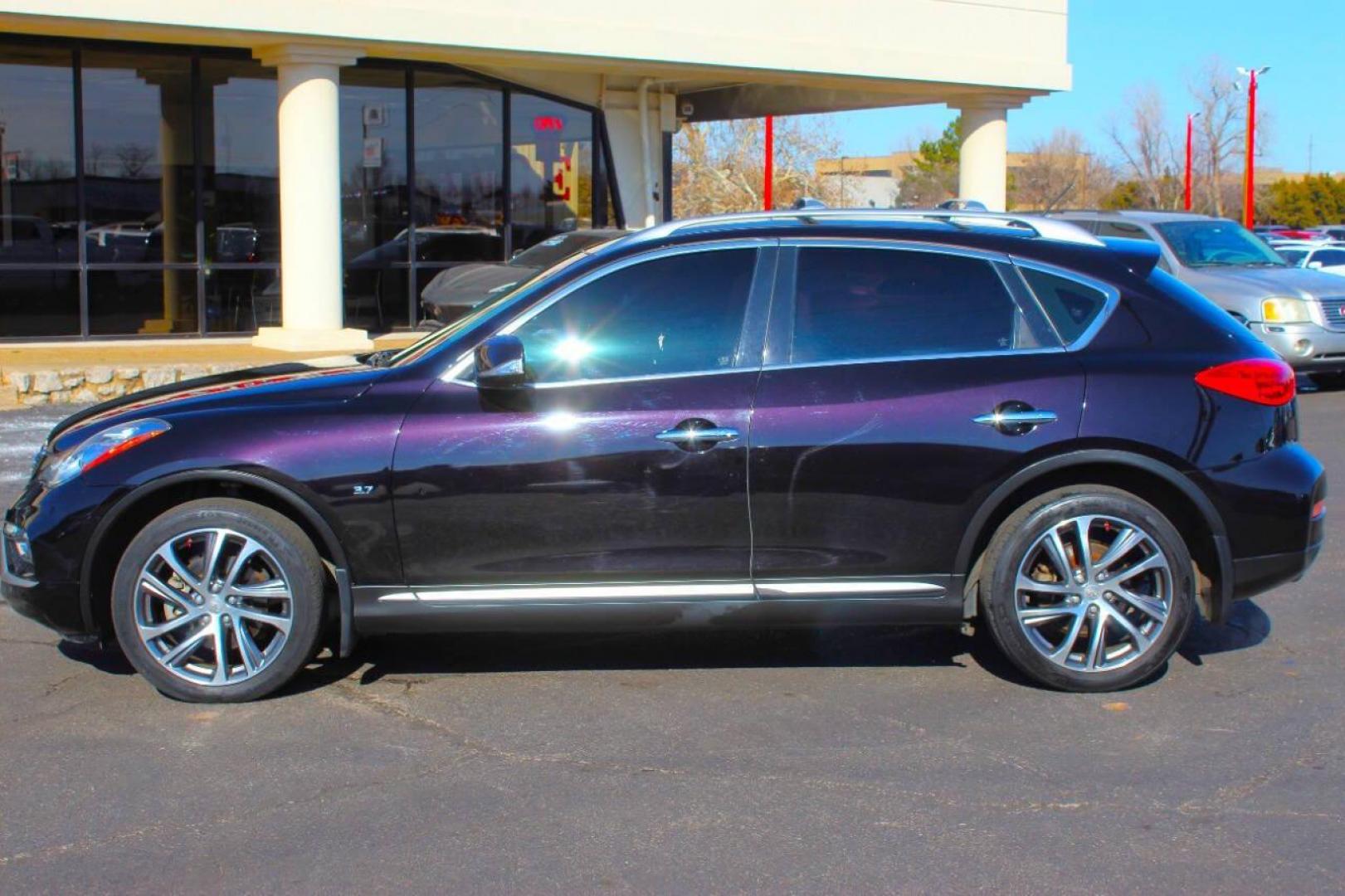 2016 Purple Infiniti QX50 Base AWD (JN1BJ0RR7GM) with an 3.7L V6 DOHC 24V engine, 7A transmission, located at 4301 NW 39th , Oklahoma City, OK, 73112, (405) 949-5600, 35.512135, -97.598671 - NO DRIVERS LICENCE NO-FULL COVERAGE INSURANCE-NO CREDIT CHECK. COME ON OVER TO SUPERSPORTS AND TAKE A LOOK AND TEST DRIVE. PLEASE GIVE US A CALL AT (405) 949-5600 . NO LICENSIA DE MANEJAR- NO SEGURO DE COBERTURA TOTAL- NO VERIFICACCION DE CREDITO. POR FAVOR VENGAN A SUPERSPORTS, ECHE UN - Photo#5