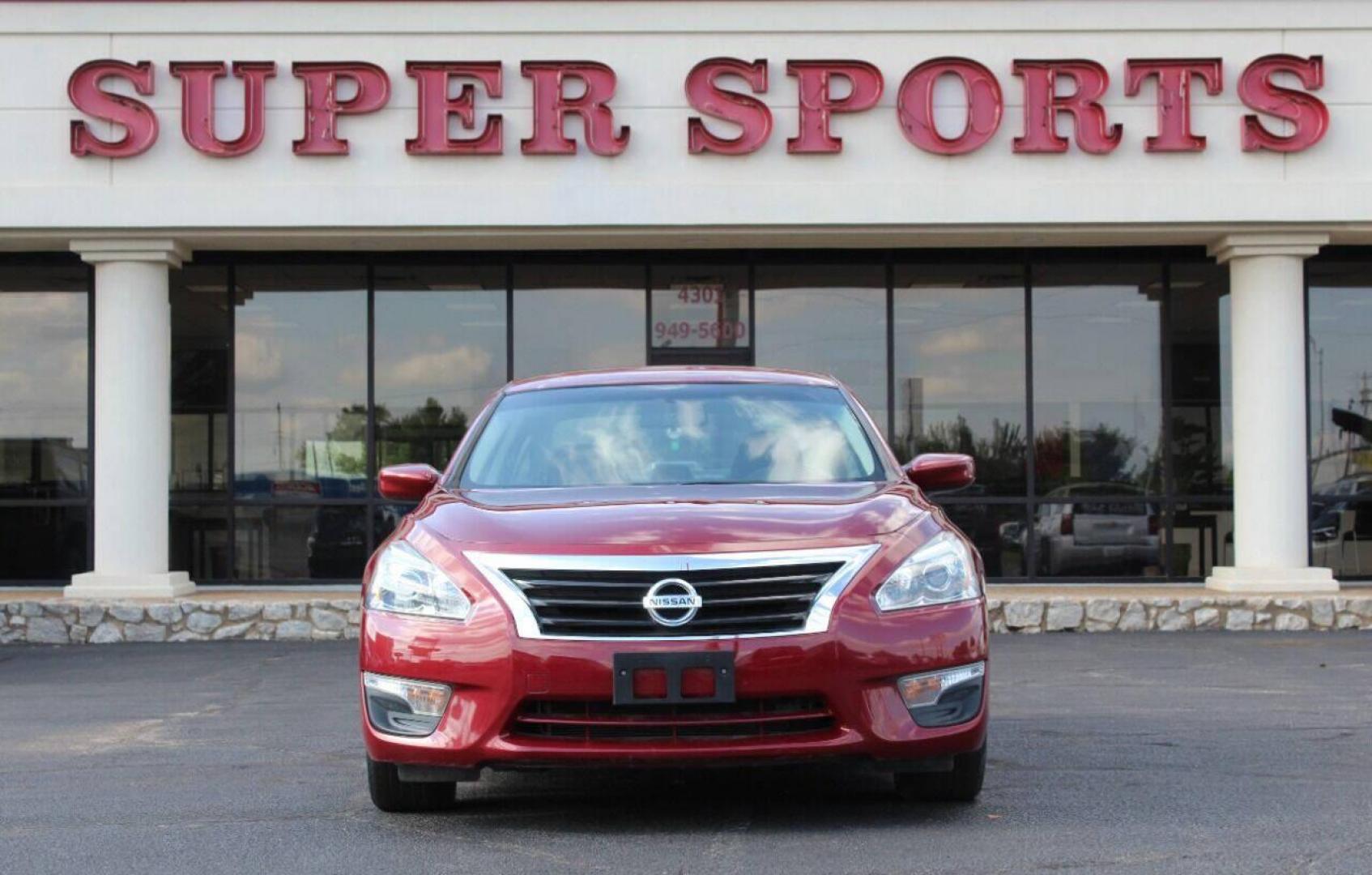 2015 Red Nissan Altima 2.5 S (1N4AL3AP7FC) with an 2.5L L4 DOHC 16V engine, Continuously Variable Transmission transmission, located at 4301 NW 39th , Oklahoma City, OK, 73112, (405) 949-5600, 35.512135, -97.598671 - NO DRIVERS LICENCE NO-FULL COVERAGE INSURANCE-NO CREDIT CHECK. COME ON OVER TO SUPERSPORTS AND TAKE A LOOK AND TEST DRIVE. PLEASE GIVE US A CALL AT (405) 949-5600. NO LICENSIA DE MANEJAR- NO SEGURO DE COBERTURA TOTAL- NO VERIFICACCION DE CREDITO. POR FAVOR VENGAN A SUPERSPORTS, - Photo#2