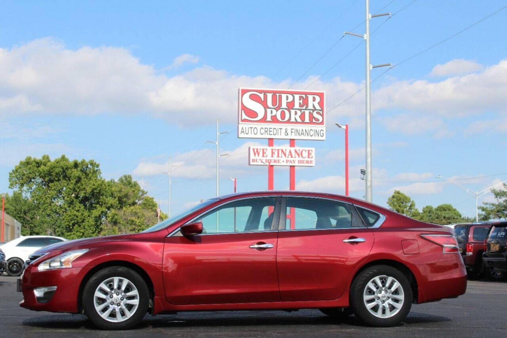 2015 Red Nissan Altima 2.5 S (1N4AL3AP7FC) with an 2.5L L4 DOHC 16V engine, Continuously Variable Transmission transmission, located at 4301 NW 39th , Oklahoma City, OK, 73112, (405) 949-5600, 35.512135, -97.598671 - NO DRIVERS LICENCE NO-FULL COVERAGE INSURANCE-NO CREDIT CHECK. COME ON OVER TO SUPERSPORTS AND TAKE A LOOK AND TEST DRIVE. PLEASE GIVE US A CALL AT (405) 949-5600. NO LICENSIA DE MANEJAR- NO SEGURO DE COBERTURA TOTAL- NO VERIFICACCION DE CREDITO. POR FAVOR VENGAN A SUPERSPORTS, - Photo#6