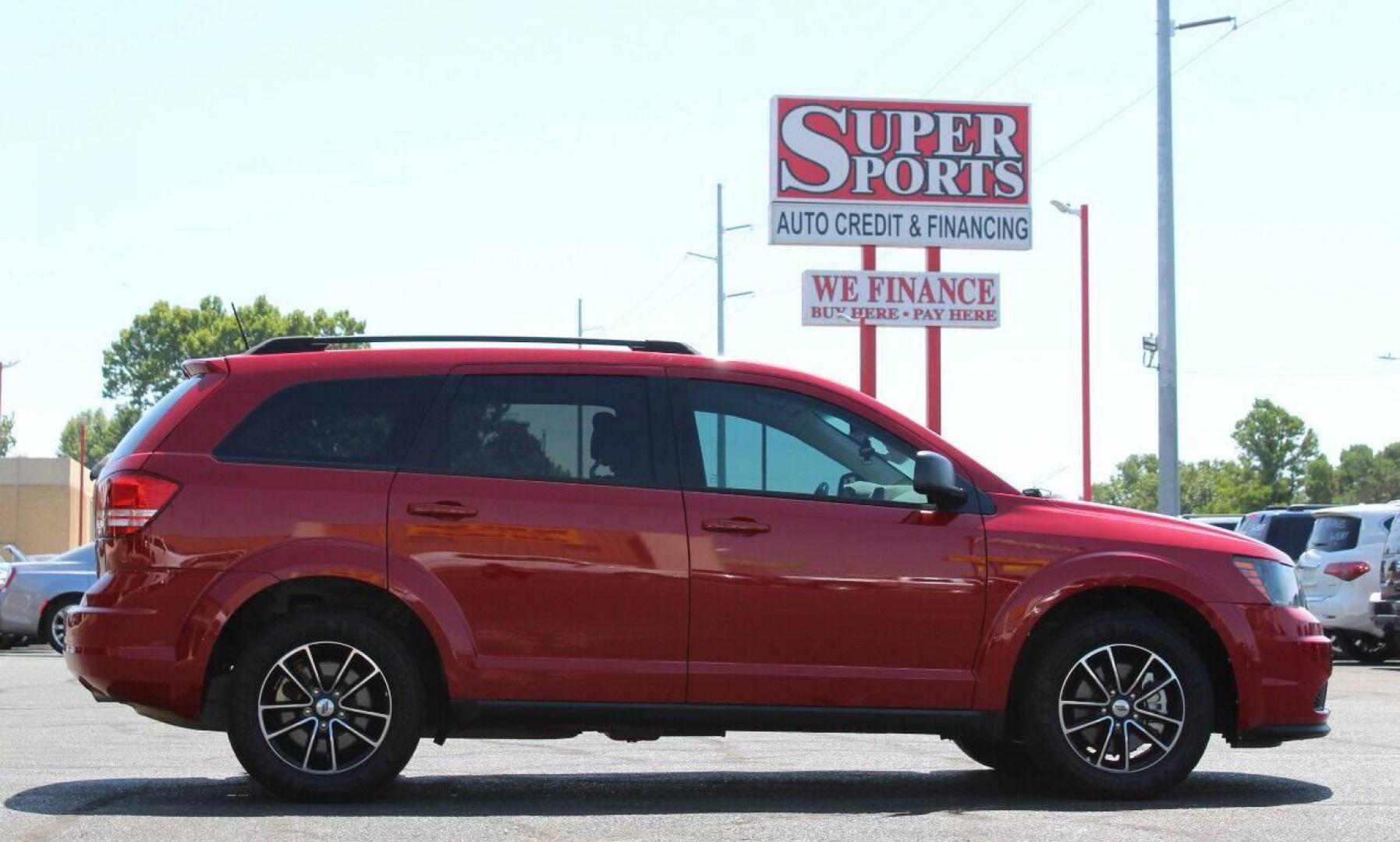 2018 Red Dodge Journey SE (3C4PDCAB3JT) with an 2.4L L4 DOHC 16V engine, 4A transmission, located at 4301 NW 39th , Oklahoma City, OK, 73112, (405) 949-5600, 35.512135, -97.598671 - NO DRIVERS LICENCE NO-FULL COVERAGE INSURANCE-NO CREDIT CHECK. COME ON OVER TO SUPERSPORTS AND TAKE A LOOK AND TEST DRIVE. PLEASE GIVE US A CALL AT (405) 949-5600. NO LICENSIA DE MANEJAR - NO SEGURO DE COBERTURA TOTAL - NO VERIFICACION DE CREDITO. POR FAVOR VENGAN A SUPERSPORTS, ECHE UN - Photo#3