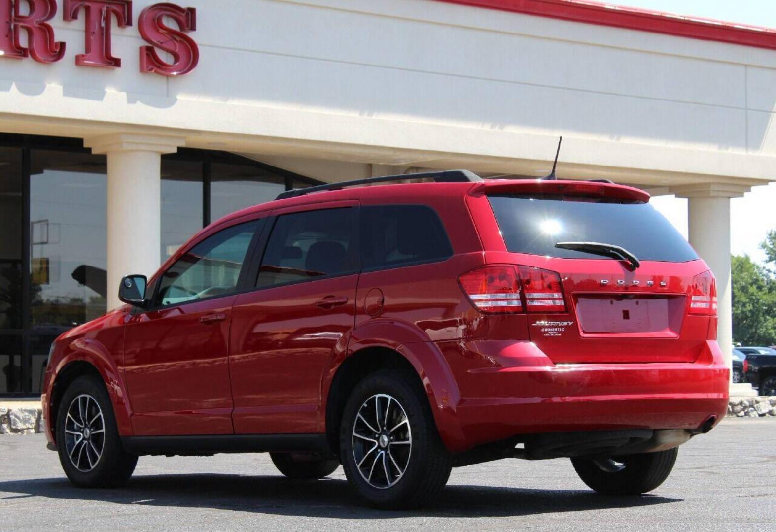 2018 Red Dodge Journey SE (3C4PDCAB3JT) with an 2.4L L4 DOHC 16V engine, 4A transmission, located at 4301 NW 39th , Oklahoma City, OK, 73112, (405) 949-5600, 35.512135, -97.598671 - NO DRIVERS LICENCE NO-FULL COVERAGE INSURANCE-NO CREDIT CHECK. COME ON OVER TO SUPERSPORTS AND TAKE A LOOK AND TEST DRIVE. PLEASE GIVE US A CALL AT (405) 949-5600. NO LICENSIA DE MANEJAR - NO SEGURO DE COBERTURA TOTAL - NO VERIFICACION DE CREDITO. POR FAVOR VENGAN A SUPERSPORTS, ECHE UN - Photo#5