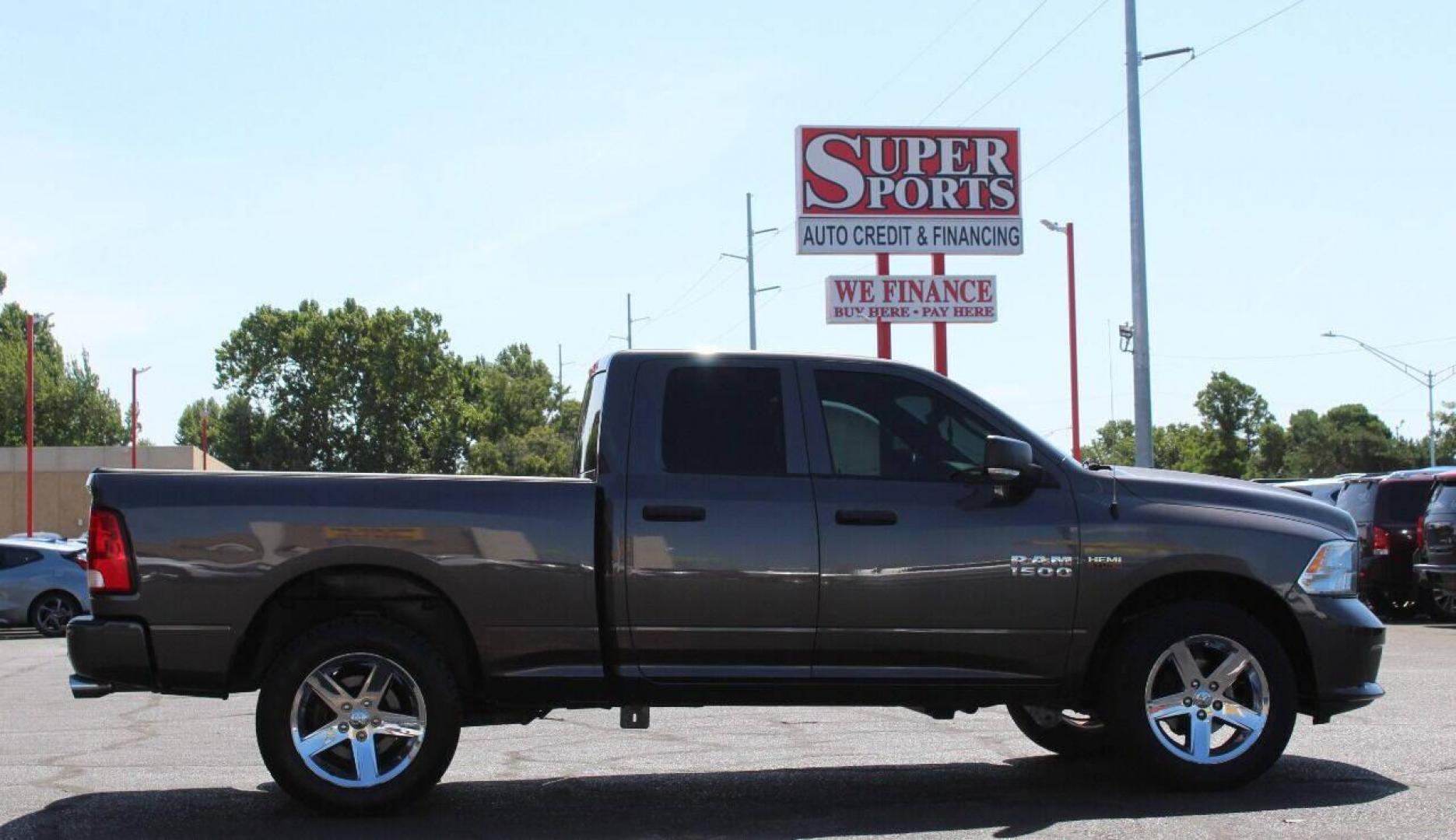 2014 Gray RAM 1500 Tradesman Quad Cab 4WD (1C6RR7FT2ES) with an 5.7L V8 OHV 16V engine, 6-Speed Automatic transmission, located at 4301 NW 39th , Oklahoma City, OK, 73112, (405) 949-5600, 35.512135, -97.598671 - NO DRIVERS LICENCE NO-FULL COVERAGE INSURANCE-NO CREDIT CHECK. COME ON OVER TO SUPERSPORTS AND TAKE A LOOK AND TEST DRIVE. PLEASE GIVE US A CALL AT (405) 949-5600. NO LICENSIA DE MANEJAR- NO SEGURO DE COBERTURA TOTAL- NO VERIFICACCION DE CREDITO. POR FAVOR VENGAN A SUPERSPORTS, ECHE UN V - Photo#3