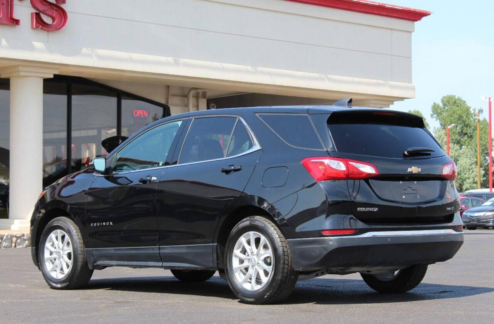 2018 Black Chevrolet Equinox LT AWD (2GNAXSEV7J6) with an 1.5L L4 DIR DOHC 16V TURBO engine, 6A transmission, located at 4301 NW 39th , Oklahoma City, OK, 73112, (405) 949-5600, 35.512135, -97.598671 - NO DRIVERS LICENCE NO-FULL COVERAGE INSURANCE-NO CREDIT CHECK. COME ON OVER TO SUPERSPORTS AND TAKE A LOOK AND TEST DRIVE. PLEASE GIVE US A CALL AT (405) 949-5600. NO LICENSIA DE MANEJAR- NO SEGURO DE COBERTURA TOTAL- NO VERIFICACCION DE CREDITO. POR FAVOR VENGAN A SUPERSPORTS, ECHE UN - Photo#5