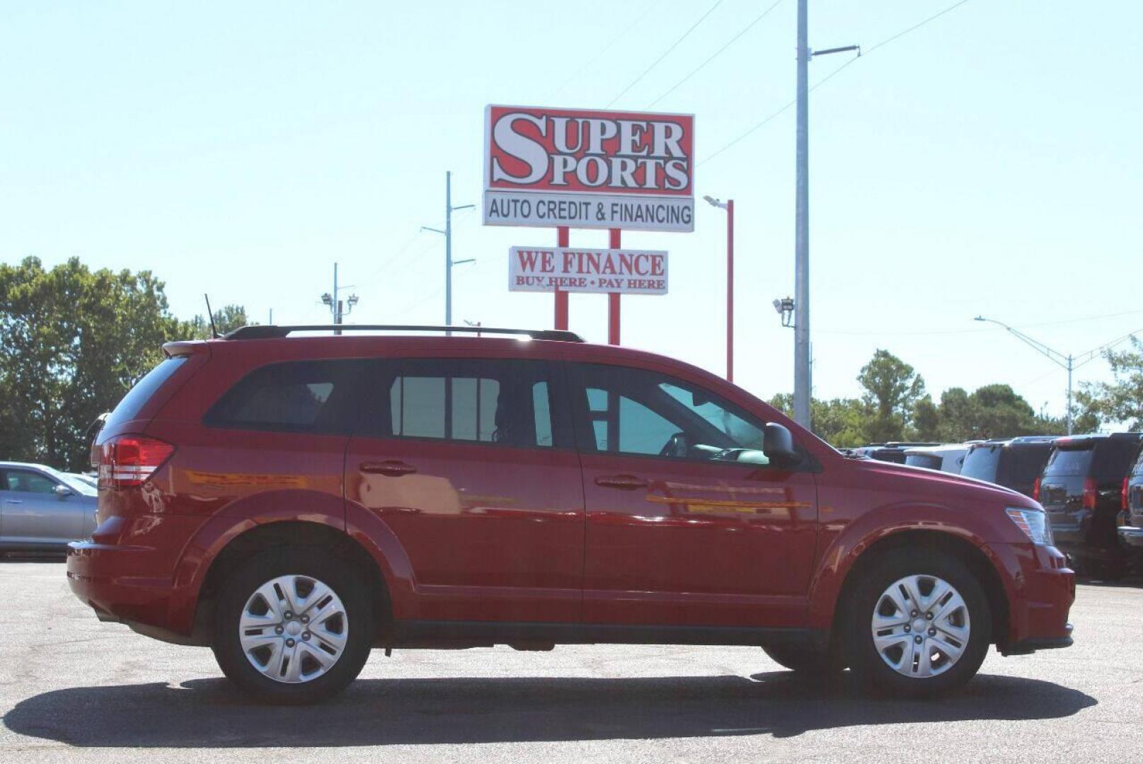 2020 Red Dodge Journey SE Value (3C4PDCAB5LT) with an 2.4L L4 DOHC 16V engine, 6A transmission, located at 4301 NW 39th , Oklahoma City, OK, 73112, (405) 949-5600, 35.512135, -97.598671 - NO DRIVERS LICENCE NO-FULL COVERAGE INSURANCE-NO CREDIT CHECK. COME ON OVER TO SUPERSPORTS AND TAKE A LOOK AND TEST DRIVE. PLEASE GIVE US A CALL AT (405) 949-5600. NO LICENSIA DE MANEJAR- NO SEGURO DE COBERTURA TOTAL- NO VERIFICACCION DE CREDITO. POR FAVOR VENGAN A SUPERSPORTS, EC - Photo#3