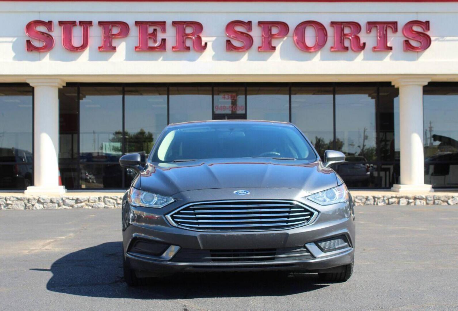 2018 Gray Ford Fusion SE (3FA6P0HD6JR) with an 1.5L L4 DOHC 16V engine, 6A transmission, located at 4301 NW 39th , Oklahoma City, OK, 73112, (405) 949-5600, 35.512135, -97.598671 - NO DRIVERS LICENCE NO - FULL COVERAGE INSURANCE - NO CREDIT CHECK. COME ON OVER TO SUPERSPORTS AND TAKE A LOOK AND TEST DRIVE. PLEASE GIVE US A CALL AT (405) 949-5600. NO LICENCIA DE MANEJAR - NO SEGURO DE COBERTURA TOTAL - NO VERIFICACION DE CREDITO. POR FAVOR VENGAN A SUPERSPORTS, ECH - Photo#2