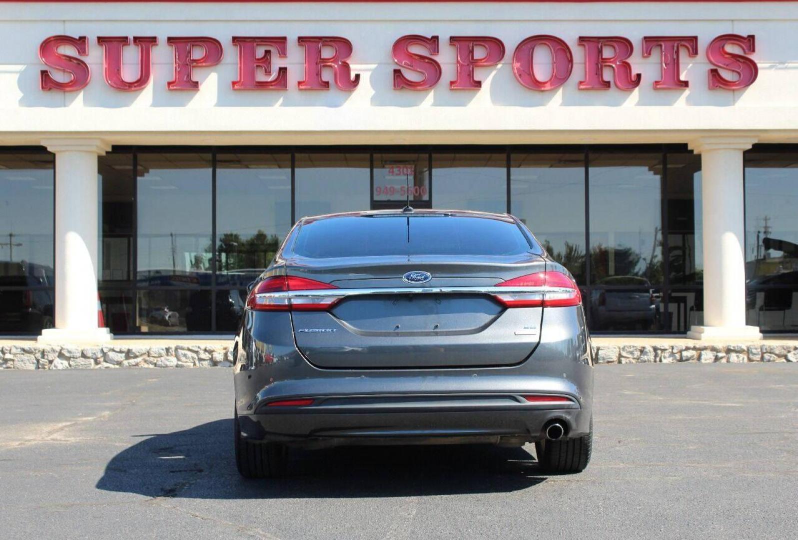 2018 Gray Ford Fusion SE (3FA6P0HD6JR) with an 1.5L L4 DOHC 16V engine, 6A transmission, located at 4301 NW 39th , Oklahoma City, OK, 73112, (405) 949-5600, 35.512135, -97.598671 - NO DRIVERS LICENCE NO - FULL COVERAGE INSURANCE - NO CREDIT CHECK. COME ON OVER TO SUPERSPORTS AND TAKE A LOOK AND TEST DRIVE. PLEASE GIVE US A CALL AT (405) 949-5600. NO LICENCIA DE MANEJAR - NO SEGURO DE COBERTURA TOTAL - NO VERIFICACION DE CREDITO. POR FAVOR VENGAN A SUPERSPORTS, ECH - Photo#4