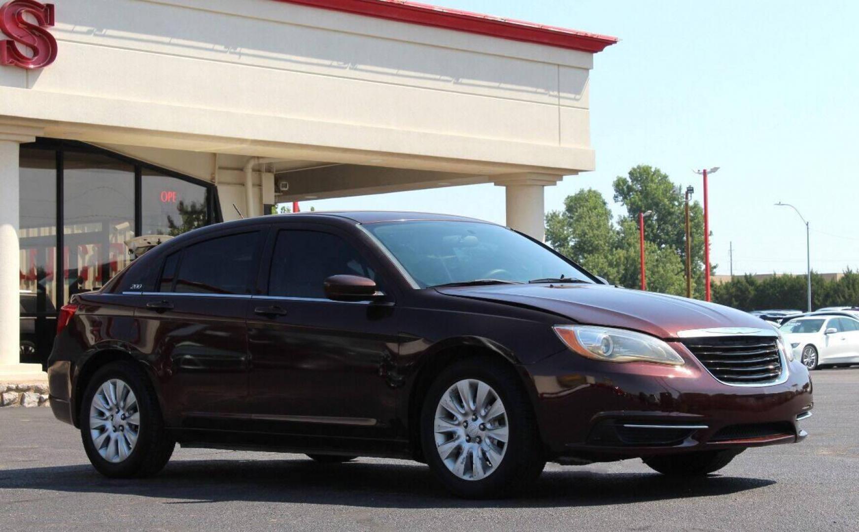 2013 Brown Chrysler 200 LX (1C3CCBAB2DN) with an 2.4L L4 DOHC 16V engine, 6-Speed Automatic transmission, located at 4301 NW 39th , Oklahoma City, OK, 73112, (405) 949-5600, 35.512135, -97.598671 - NO DRIVERS LICENCE NO - FULL COVERAGE INSURANCE - NO CREDIT CHECK. COME ON OVER TO SUPERSPORTS AND TAKE A LOOK AND TEST DRIVE PLEASE GIVE US A CALL AT (405) 949-5600. NO LICENCIA DE MANEJAR - NO SEGURO DE COBERTURA TOTAL - NO VERIFICACION DE CREDITO. POR FAVOR VENGAN A SUPERSPORTS, ECHE - Photo#2