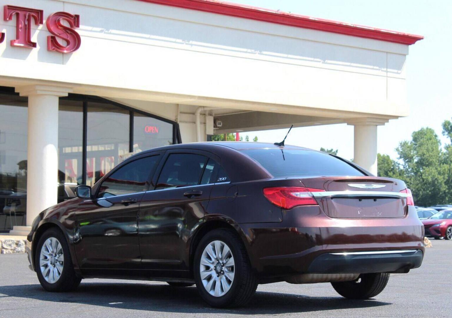 2013 Brown Chrysler 200 LX (1C3CCBAB2DN) with an 2.4L L4 DOHC 16V engine, 6-Speed Automatic transmission, located at 4301 NW 39th , Oklahoma City, OK, 73112, (405) 949-5600, 35.512135, -97.598671 - NO DRIVERS LICENCE NO - FULL COVERAGE INSURANCE - NO CREDIT CHECK. COME ON OVER TO SUPERSPORTS AND TAKE A LOOK AND TEST DRIVE PLEASE GIVE US A CALL AT (405) 949-5600. NO LICENCIA DE MANEJAR - NO SEGURO DE COBERTURA TOTAL - NO VERIFICACION DE CREDITO. POR FAVOR VENGAN A SUPERSPORTS, ECHE - Photo#5