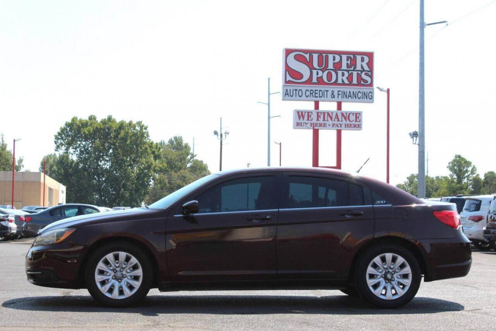 2013 Brown Chrysler 200 LX (1C3CCBAB2DN) with an 2.4L L4 DOHC 16V engine, 6-Speed Automatic transmission, located at 4301 NW 39th , Oklahoma City, OK, 73112, (405) 949-5600, 35.512135, -97.598671 - NO DRIVERS LICENCE NO - FULL COVERAGE INSURANCE - NO CREDIT CHECK. COME ON OVER TO SUPERSPORTS AND TAKE A LOOK AND TEST DRIVE PLEASE GIVE US A CALL AT (405) 949-5600. NO LICENCIA DE MANEJAR - NO SEGURO DE COBERTURA TOTAL - NO VERIFICACION DE CREDITO. POR FAVOR VENGAN A SUPERSPORTS, ECHE - Photo#6