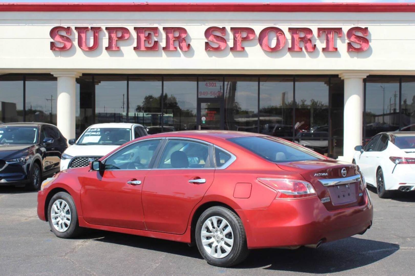 2013 Maroon Nissan Altima 2.5 S (1N4AL3AP8DN) with an 2.5L L4 DOHC 16V engine, CVT transmission, located at 4301 NW 39th , Oklahoma City, OK, 73112, (405) 949-5600, 35.512135, -97.598671 - NO DRIVERS LICENCE NO-FULL COVERAGE INSURANCE-NO CREDIT CHECK. COME ON OVER TO SUPERSPORTS AND TAKE A LOOK AND TEST DRIVE. PLEASE GIVE US A CALL AT (405) 949-5600. NO LICENSIA DE MANEJAR- NO SEGURO DE COBERTURA TOTAL- NO VERIFICACCION DE CREDITO. POR FAVOR VENGAN A SUPERSPORTS, ECHE UN - Photo#5