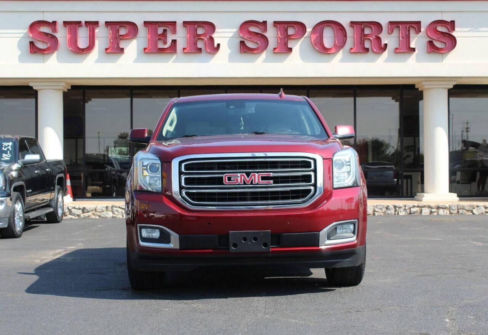 2017 Maroon GMC Yukon SLE 2WD (1GKS1AKC1HR) with an 5.3L V8 OHV 16V engine, 6A transmission, located at 4301 NW 39th , Oklahoma City, OK, 73112, (405) 949-5600, 35.512135, -97.598671 - NO DRIVERS LICENSE - NO FULL COVERAGE INSURANCE - NO CREDIT CHECK. COME ON OVER TO SUPERSPORTS AND TAKE A LOOK AND TEST DRIVE PLEASE GIVE US A CALL AT (405) 949-5600. NO LICENCIA DE MANEJAR - NO SEGURO DE COBERTURA TOTAL - NO VERIFICACION DE CREDITO. POR FAVOR VENGAN A SUPERSPOR - Photo#2