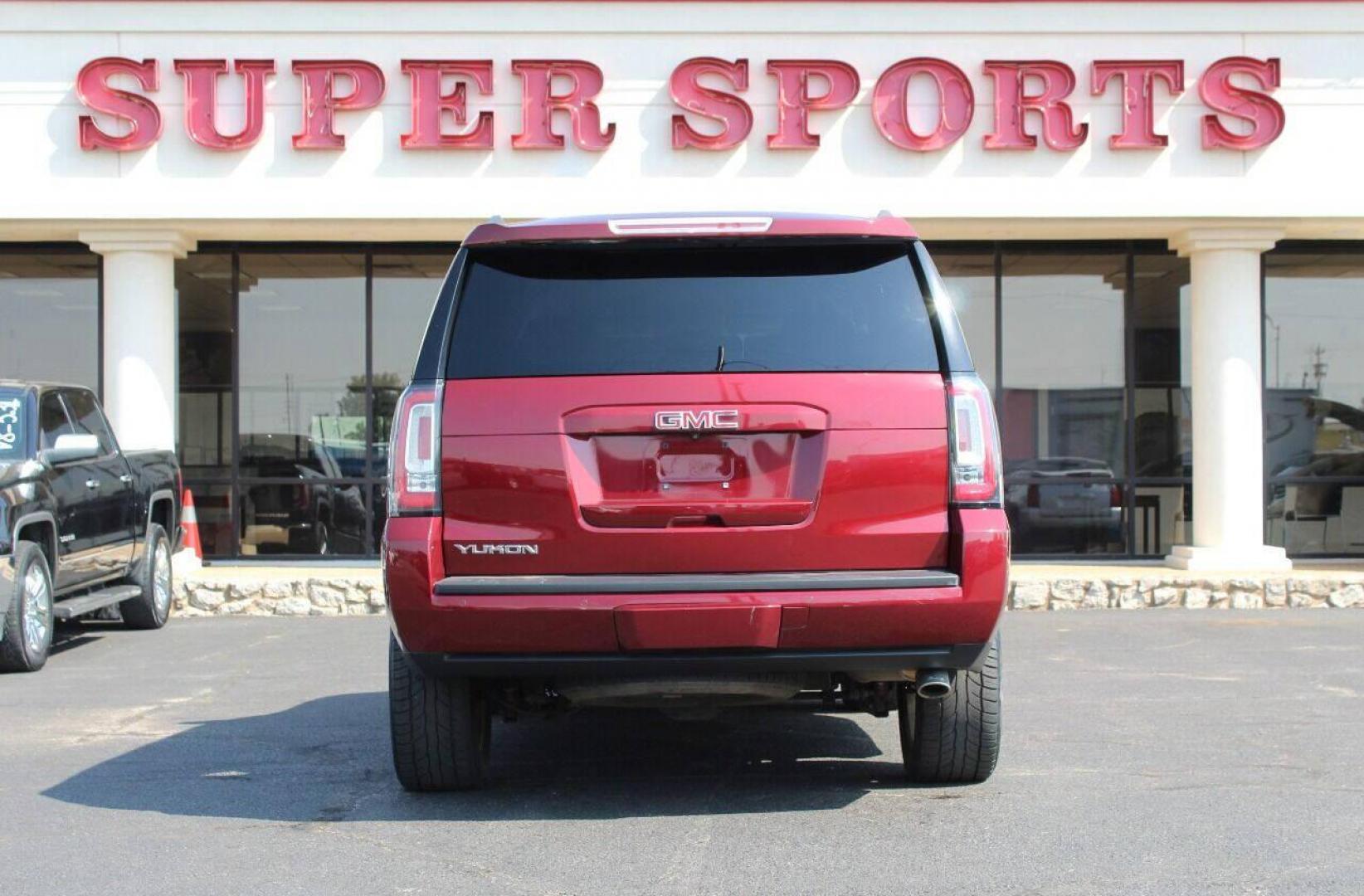 2017 Maroon GMC Yukon SLE 2WD (1GKS1AKC1HR) with an 5.3L V8 OHV 16V engine, 6A transmission, located at 4301 NW 39th , Oklahoma City, OK, 73112, (405) 949-5600, 35.512135, -97.598671 - NO DRIVERS LICENSE - NO FULL COVERAGE INSURANCE - NO CREDIT CHECK. COME ON OVER TO SUPERSPORTS AND TAKE A LOOK AND TEST DRIVE PLEASE GIVE US A CALL AT (405) 949-5600. NO LICENCIA DE MANEJAR - NO SEGURO DE COBERTURA TOTAL - NO VERIFICACION DE CREDITO. POR FAVOR VENGAN A SUPERSPOR - Photo#4