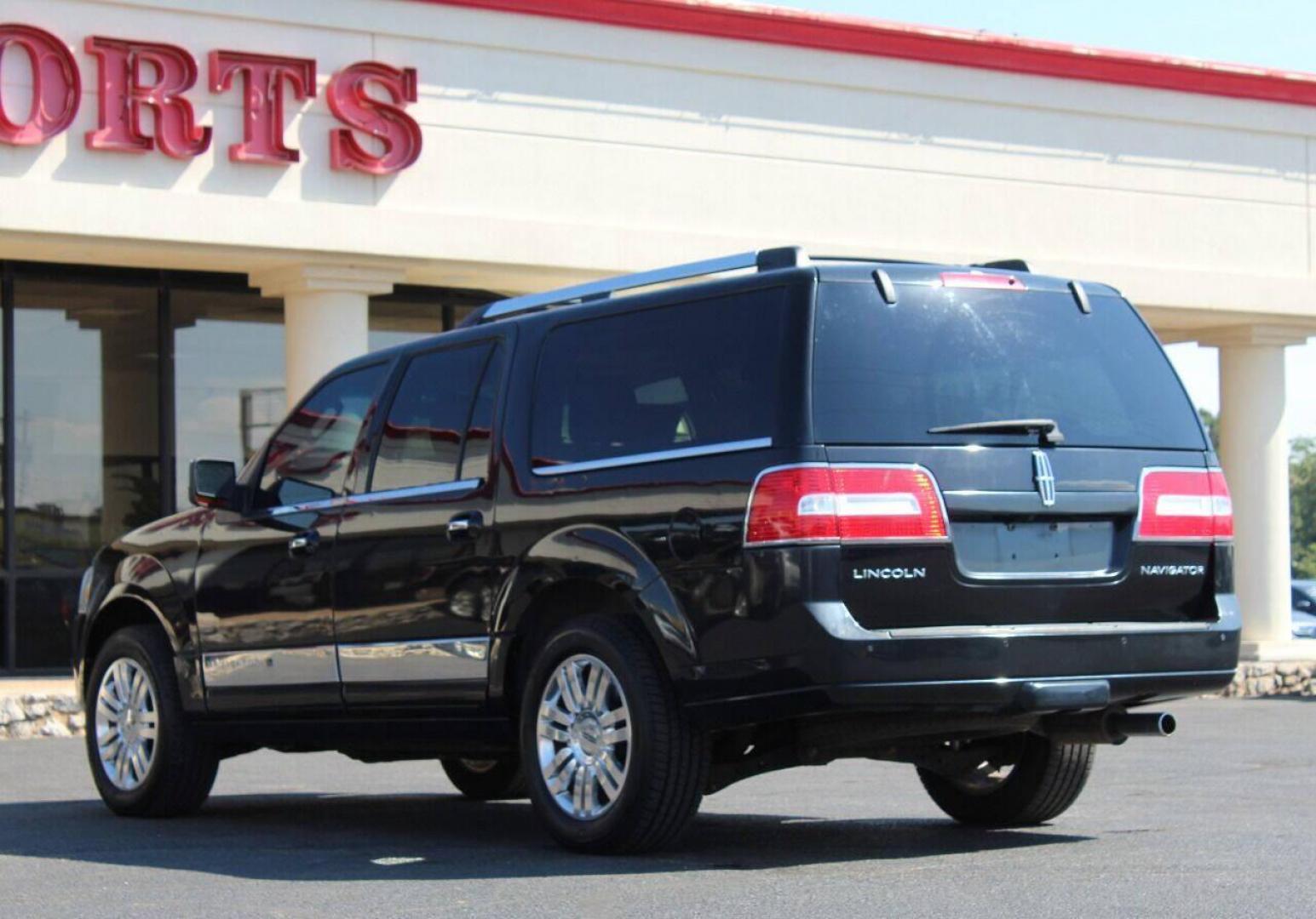 2011 Black Lincoln Navigator L 4WD (5LMJJ3J52BE) with an 5.4L V8 SOHC 24V engine, 6-Speed Automatic transmission, located at 4301 NW 39th , Oklahoma City, OK, 73112, (405) 949-5600, 35.512135, -97.598671 - NO DRIVERS LICENCE NO-FULL COVERAGE INSURANCE-NO CREDIT CHECK. COME ON OVER TO SUPERSPORTS AND TAKE A LOOK AND TEST DRIVE PLEASE GIVE US A CALL AT (405) 949-5600. NO LICENSIA DE MANEJAR- NO SEGURO DE COBERTURA TOTAL- NO VERIFICACCION DE CREDITO. POR FAVOR VENGAN A SUPERSPORTS, ECHE UN V - Photo#5