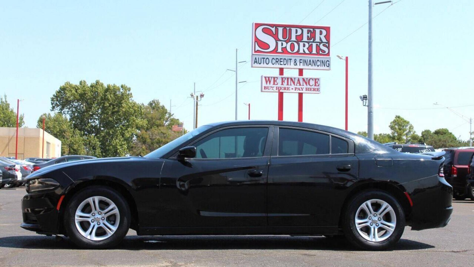 2020 Black Dodge Charger (2C3CDXBG0LH) with an 3.6L V6 3.6L V6 engine, Automatic 8-Speed transmission, located at 4301 NW 39th , Oklahoma City, OK, 73112, (405) 949-5600, 35.512135, -97.598671 - NO DRIVERS LICENSE - NO FULL COVERAGE INSURANCE - NO CREDIT CHECK. COME ON OVER TO SUPERSPORTS AND TAKE A LOOK AND TEST DRIVE PLEASE GIVE US A CALL AT (405) 949-5600. NO LICENCIA DE MANEJAR - NO SEGURO DE COBERTURA TOTAL - NO VERIFICACION DE CREDITO. POR FAVOR VENGAN A SUPERSPORTS, ECHE - Photo#6