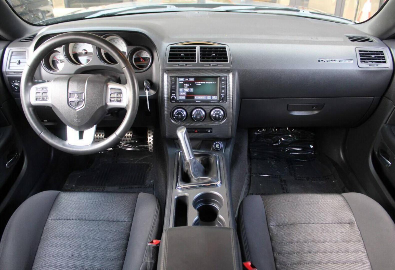 2014 Black Dodge Challenger R/T (2C3CDYBT3EH) with an 5.7L V8 OHV 16V engine, Manual 6-Speed transmission, located at 4301 NW 39th , Oklahoma City, OK, 73112, (405) 949-5600, 35.512135, -97.598671 - NO DRIVERS LICENCE - NO FULL COVERAGE INSURANCE - NO CREDIT CHECK. COME ON OVER TO SUPERSPORTS AND TAKE A LOOK AND TEST DRIVE. PLEASE GIVE US A CALL AT (405) 949-5600. NO LICENCIA DE MANEJAR - NO SEGURO DE COBERTURA TOTAL - NO VERIFICACCION DE CREDITO. POR FAVOR VENGAN A SUPERSPORTS, EC - Photo#12