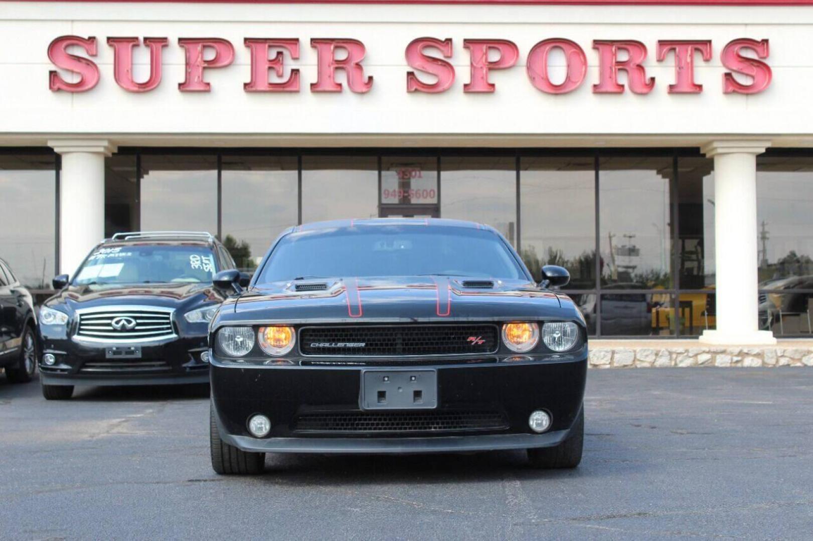 2014 Black Dodge Challenger R/T (2C3CDYBT3EH) with an 5.7L V8 OHV 16V engine, Manual 6-Speed transmission, located at 4301 NW 39th , Oklahoma City, OK, 73112, (405) 949-5600, 35.512135, -97.598671 - NO DRIVERS LICENCE - NO FULL COVERAGE INSURANCE - NO CREDIT CHECK. COME ON OVER TO SUPERSPORTS AND TAKE A LOOK AND TEST DRIVE. PLEASE GIVE US A CALL AT (405) 949-5600. NO LICENCIA DE MANEJAR - NO SEGURO DE COBERTURA TOTAL - NO VERIFICACCION DE CREDITO. POR FAVOR VENGAN A SUPERSPORTS, EC - Photo#2