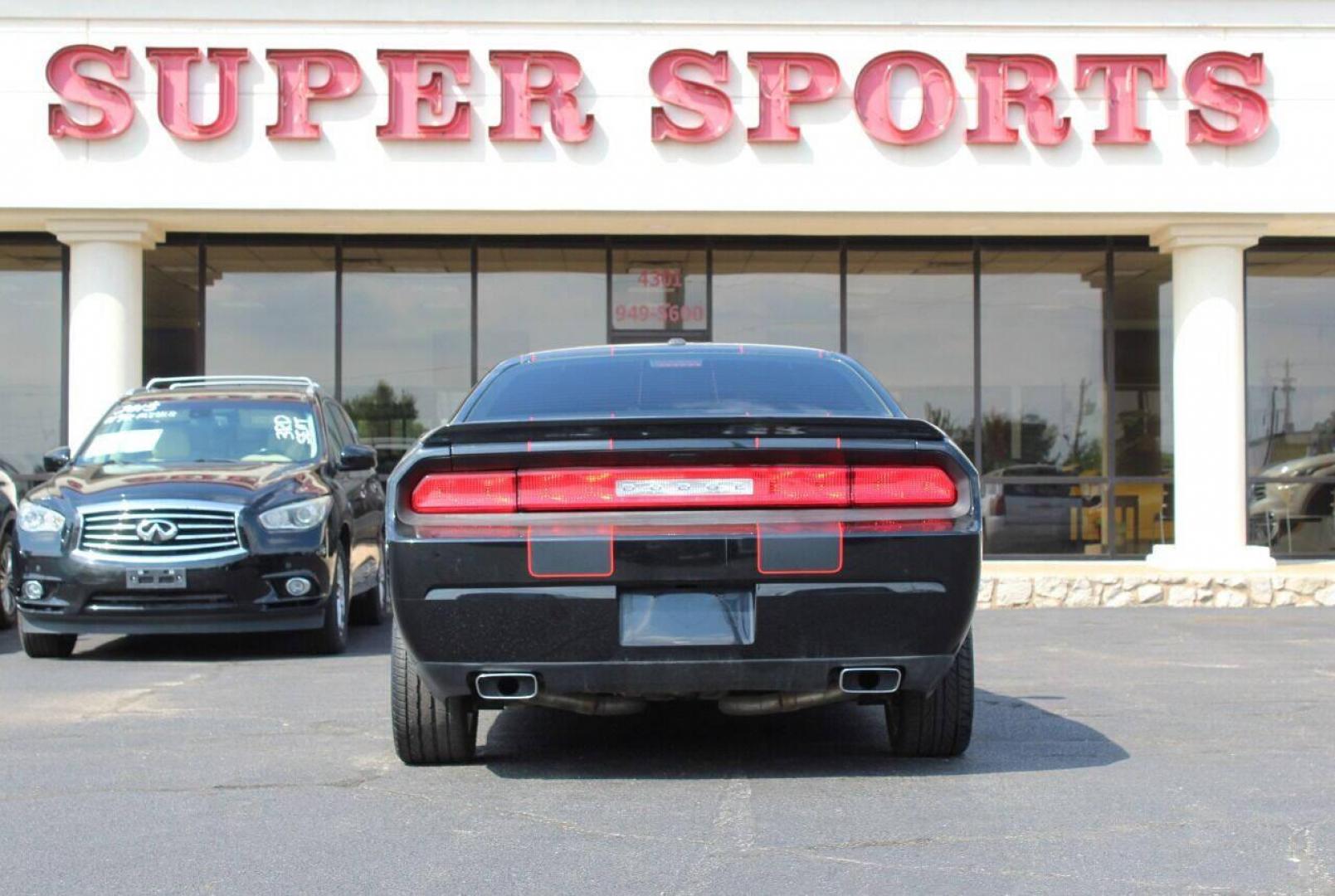 2014 Black Dodge Challenger R/T (2C3CDYBT3EH) with an 5.7L V8 OHV 16V engine, Manual 6-Speed transmission, located at 4301 NW 39th , Oklahoma City, OK, 73112, (405) 949-5600, 35.512135, -97.598671 - NO DRIVERS LICENCE - NO FULL COVERAGE INSURANCE - NO CREDIT CHECK. COME ON OVER TO SUPERSPORTS AND TAKE A LOOK AND TEST DRIVE. PLEASE GIVE US A CALL AT (405) 949-5600. NO LICENCIA DE MANEJAR - NO SEGURO DE COBERTURA TOTAL - NO VERIFICACCION DE CREDITO. POR FAVOR VENGAN A SUPERSPORTS, EC - Photo#5