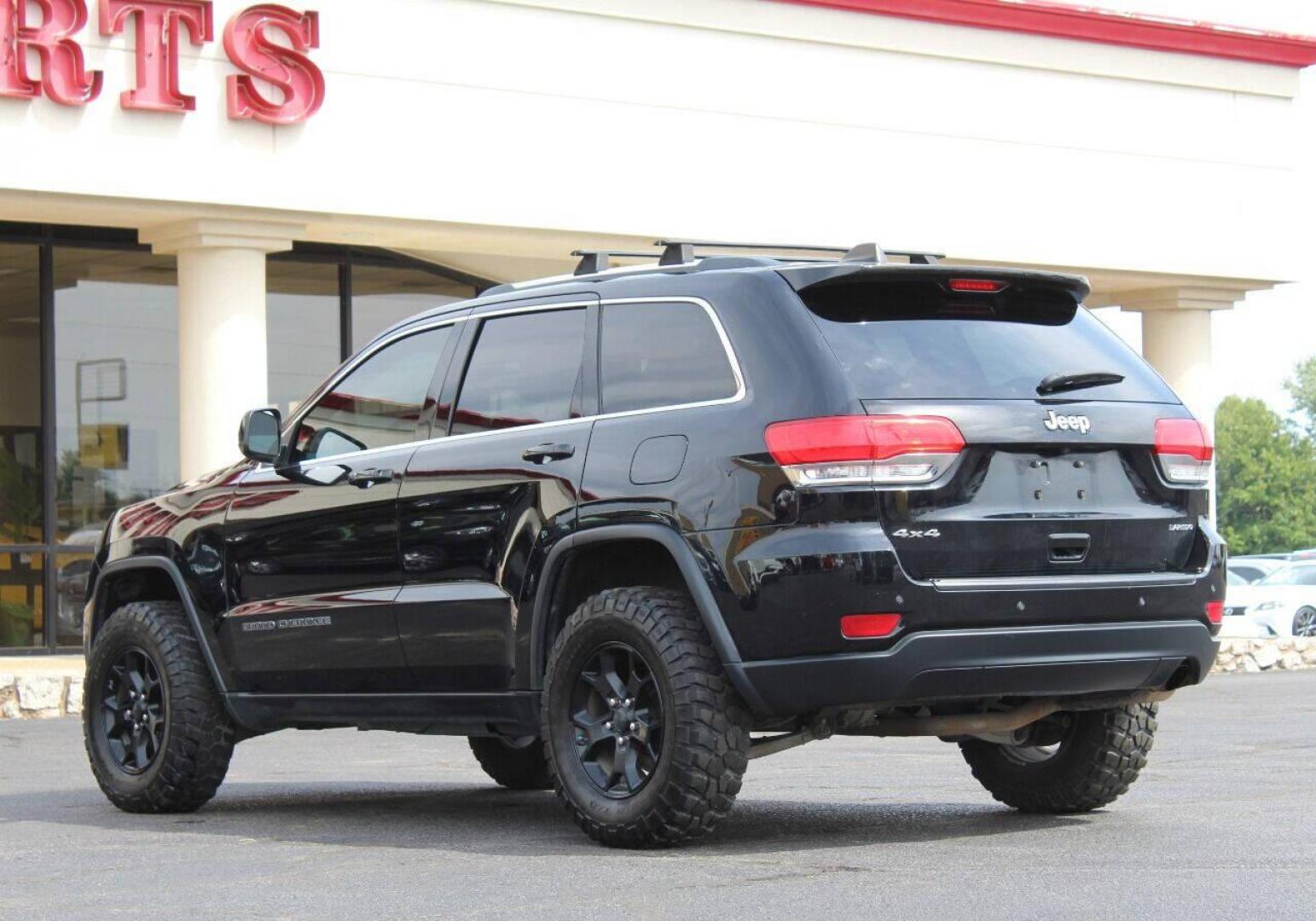 2017 Black Jeep Grand Cherokee Laredo 4WD (1C4RJFAG9HC) with an 3.6L V6 DOHC 24V engine, 8A transmission, located at 4301 NW 39th , Oklahoma City, OK, 73112, (405) 949-5600, 35.512135, -97.598671 - NO DRIVERS LICENSE - NO FULL COVERAGE INSURANCE - NO CREDIT CHECK. COME ON OVER TO SUPERSPORTS AND TAKE A LOOK AND TEST DRIVE PLEASE GIVE US A CALL AT (405) 949-5600. NO LICENCIA DE MANEJAR - NO SEGURO DE COBERTURA TOTAL - NO VERIFICACION DE CREDITO. POR FAVOR VENGAN A SUPERSPOR - Photo#5