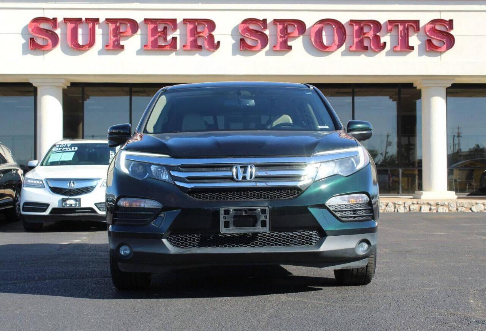 2016 Green Honda Pilot EXL 4WD (5FNYF6H53GB) with an 3.5L V6 SOHC 24V engine, 6-Speed Automatic transmission, located at 4301 NW 39th , Oklahoma City, OK, 73112, (405) 949-5600, 35.512135, -97.598671 - NO DRIVERS LICENCE - NO FULL COVERAGE INSURANCE - NO CREDIT CHECK. COME ON OVER TO SUPERSPORTS AND TAKE A LOOK AND TEST DRIVE. PLEASE GIVE US A CALL AT (405) 949-5600. NO LICENCIA DE MANEJAR - NO SEGURO DE COBERTURA TOTAL - NO VERIFICACION DE CREDITO. POR FAVOR VENGAN A SUPERSPORTS, ECH - Photo#2