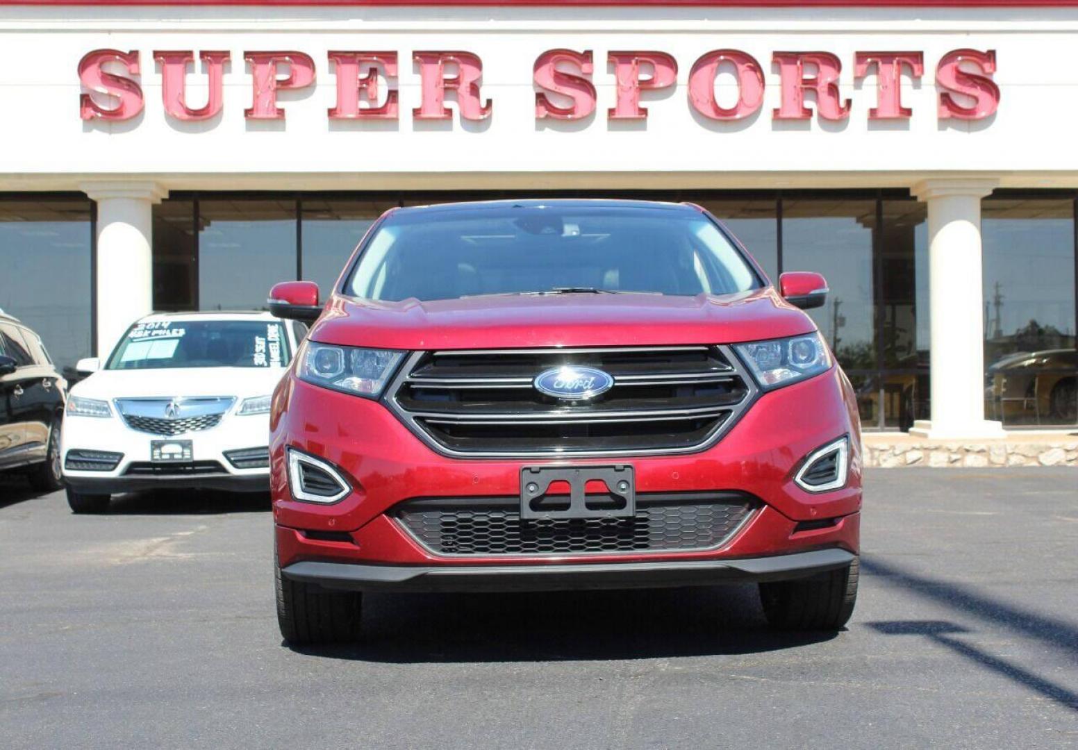 2016 Red Ford Edge Sport AWD (2FMPK4AP6GB) with an 2.7L V6 DOCH 24V engine, 6A transmission, located at 4301 NW 39th , Oklahoma City, OK, 73112, (405) 949-5600, 35.512135, -97.598671 - NO DRIVERS LICENCE - NO FULL COVERAGE INSURANCE - NO CREDIT CHECK. COME ON OVER TO SUPERSPORTS AND TAKE A LOOK AND TEST DRIVE. PLEASE GIVE US A CALL AT (405) 949-5600. NO LICENCIA DE MANEJAR - NO SEGURO DE COBERTURA TOTAL - NO VERIFICACION DE CREDITO. POR FAVOR VENGAN A SUPERSPORTS, ECH - Photo#2