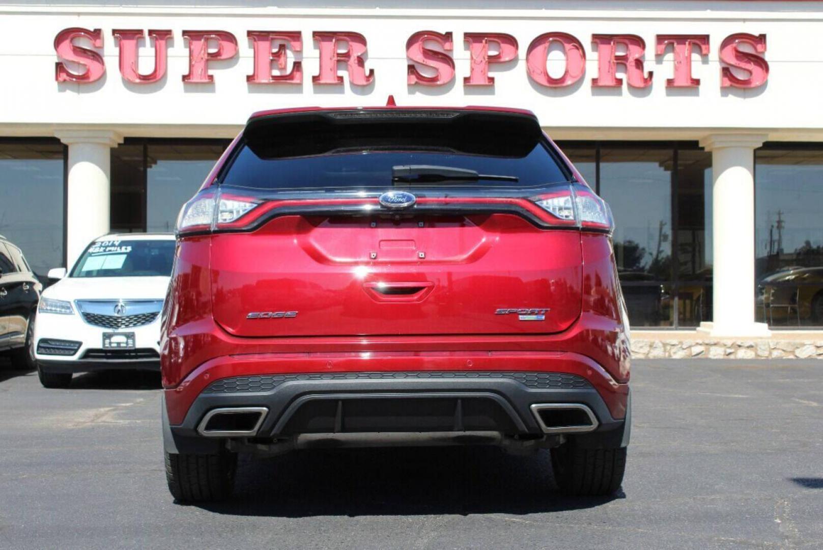 2016 Red Ford Edge Sport AWD (2FMPK4AP6GB) with an 2.7L V6 DOCH 24V engine, 6A transmission, located at 4301 NW 39th , Oklahoma City, OK, 73112, (405) 949-5600, 35.512135, -97.598671 - NO DRIVERS LICENCE - NO FULL COVERAGE INSURANCE - NO CREDIT CHECK. COME ON OVER TO SUPERSPORTS AND TAKE A LOOK AND TEST DRIVE. PLEASE GIVE US A CALL AT (405) 949-5600. NO LICENCIA DE MANEJAR - NO SEGURO DE COBERTURA TOTAL - NO VERIFICACION DE CREDITO. POR FAVOR VENGAN A SUPERSPORTS, ECH - Photo#4