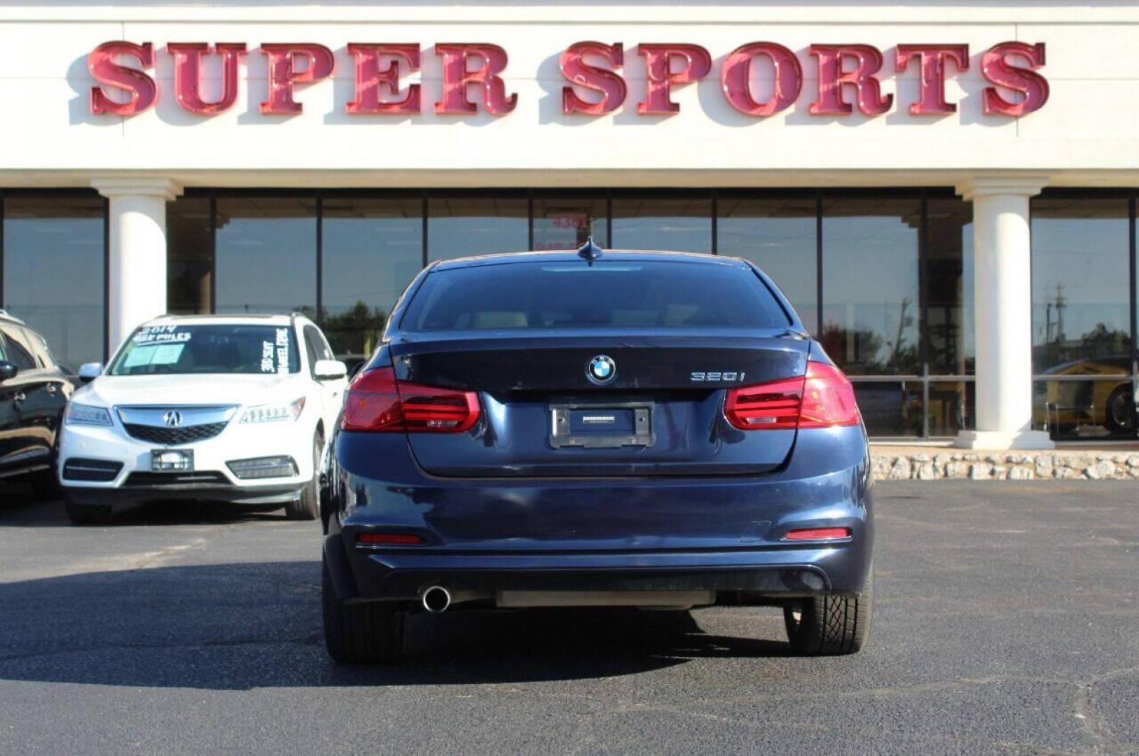 2016 Blue BMW 3-Series 320i Sedan (WBA8E1G58GN) with an 2.0L L4 DOHC 16V engine, 8A transmission, located at 4301 NW 39th , Oklahoma City, OK, 73112, (405) 949-5600, 35.512135, -97.598671 - NO DRIVERS LICENSE - NO FULL COVERAGE INSURANCE - NO CREDIT CHECK. COME ON OVER TO SUPERSPORTS AND TAKE A LOOK AND TEST DRIVE. PLEASE GIVE US A CALL AT (405) 949-5600. NO LICENCIA DE MANEJAR - NO SEGURO DE COBERTURA TOTAL - NO VERIFICACION DE CREDITO. POR FAVOR VENGAN A SUPERSPORTS, ECH - Photo#4