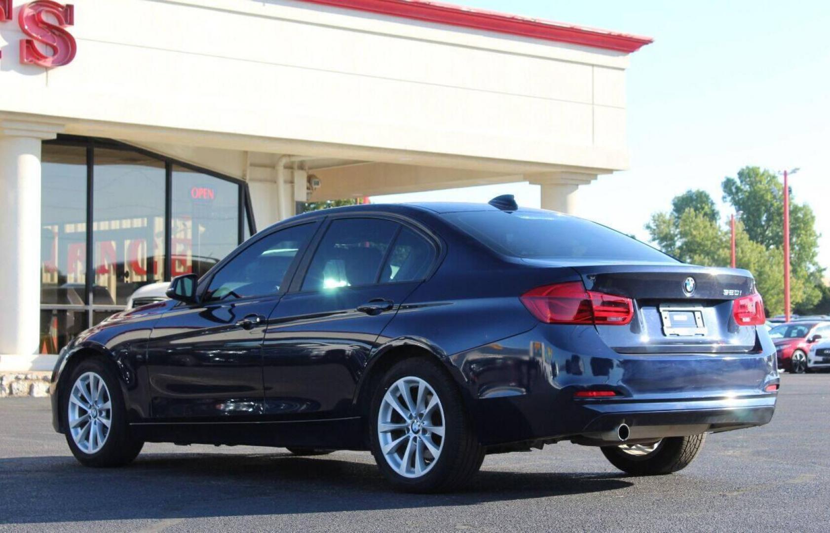 2016 Blue BMW 3-Series 320i Sedan (WBA8E1G58GN) with an 2.0L L4 DOHC 16V engine, 8A transmission, located at 4301 NW 39th , Oklahoma City, OK, 73112, (405) 949-5600, 35.512135, -97.598671 - NO DRIVERS LICENSE - NO FULL COVERAGE INSURANCE - NO CREDIT CHECK. COME ON OVER TO SUPERSPORTS AND TAKE A LOOK AND TEST DRIVE. PLEASE GIVE US A CALL AT (405) 949-5600. NO LICENCIA DE MANEJAR - NO SEGURO DE COBERTURA TOTAL - NO VERIFICACION DE CREDITO. POR FAVOR VENGAN A SUPERSPORTS, ECH - Photo#5