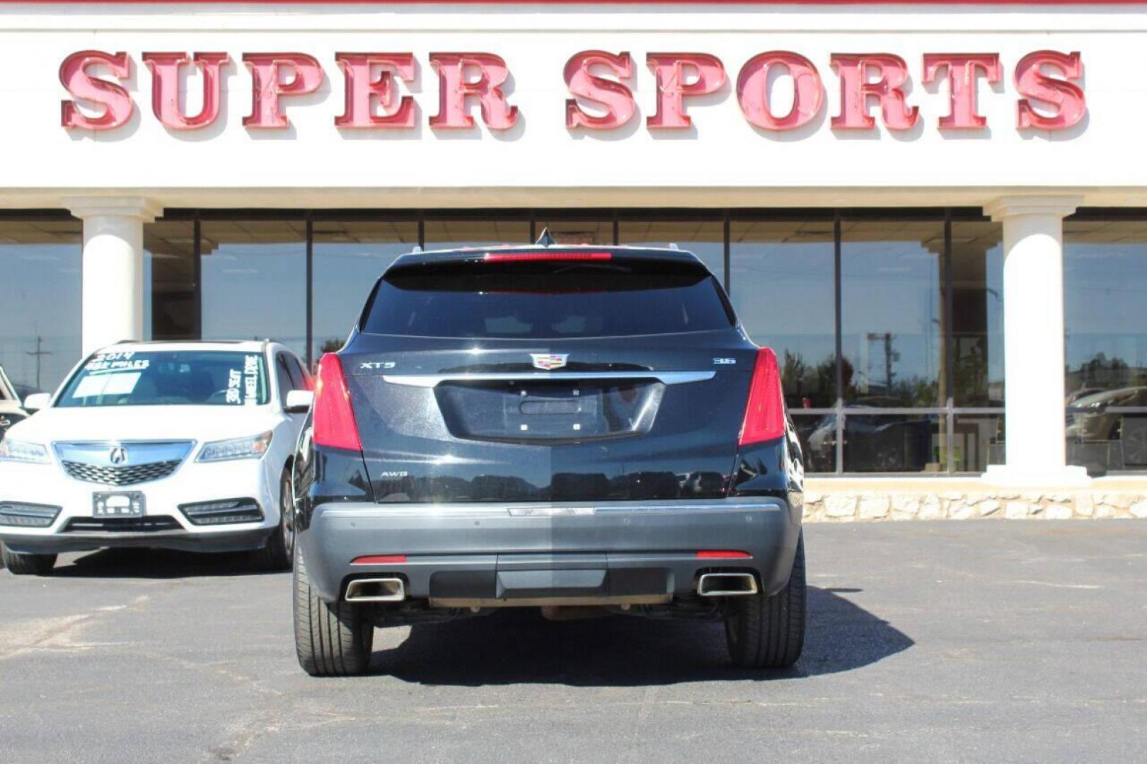 2017 Black Cadillac XT5 Premium Luxury AWD (1GYKNERS6HZ) with an 3.6L V6 DOHC 24V engine, 8A transmission, located at 4301 NW 39th , Oklahoma City, OK, 73112, (405) 949-5600, 35.512135, -97.598671 - NO DRIVERS LICENSE NO - FULL COVERAGE INSURANCE - NO CREDIT CHECK. COME ON OVER TO SUPERSPORTS AND TAKE A LOOK AND TEST DRIVE PLEASE GIVE US A CALL AT (405) 949-5600. NO LICENCIA DE MANEJAR - NO SEGURO DE COBERTURA TOTAL - NO VERIFICACION DE CREDITO. POR FAVOR VENGAN A SUPERSPORTS, ECHE U - Photo#4