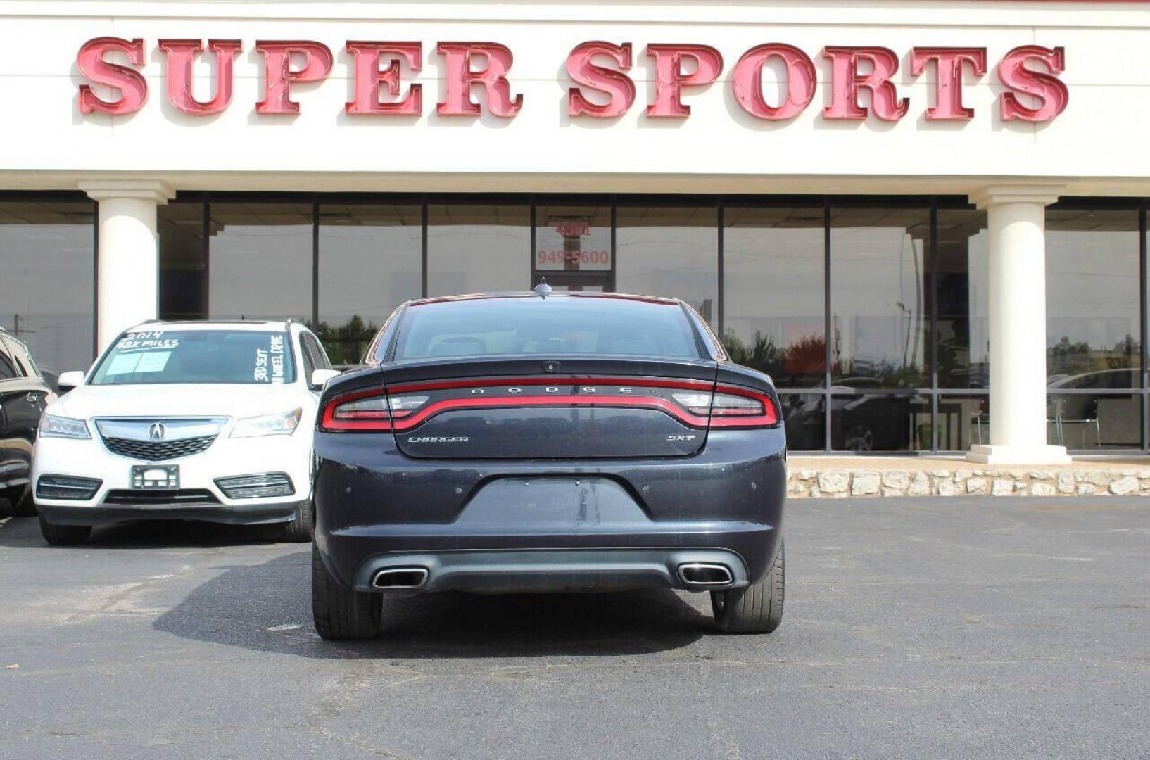 2017 Charcoal Dodge Charger SXT (2C3CDXHG4HH) with an 3.6L V6 DOHC 24V engine, 8A transmission, located at 4301 NW 39th , Oklahoma City, OK, 73112, (405) 949-5600, 35.512135, -97.598671 - NO DRIVERS LICENCE NO-FULL COVERAGE INSURANCE-NO CREDIT CHECK. COME ON OVER TO SUPERSPORTS AND TAKE A LOOK AND TEST DRIVE. PLEASE GIVE US A CALL AT (405) 949-5600. NO LICENSIA DE MANEJAR- NO SEGURO DE COBERTURA TOTAL- NO VERIFICACCION DE CREDITO. POR FAVOR VENGAN A SUPERSPORTS, ECHE UN - Photo#4