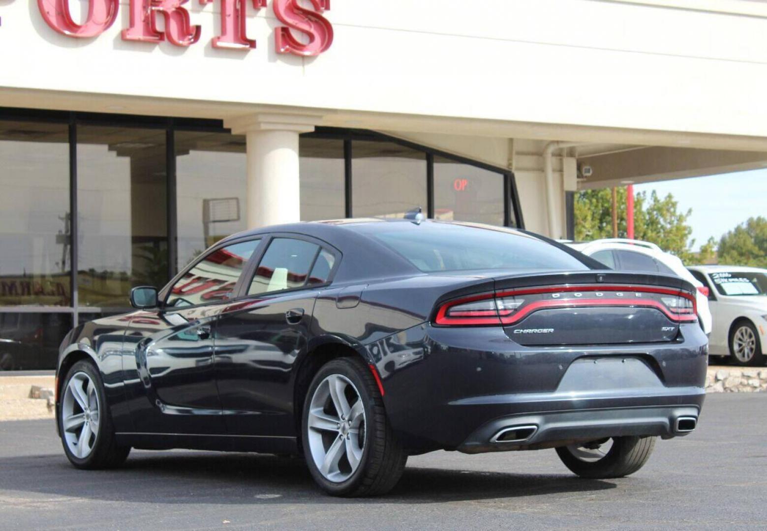 2017 Charcoal Dodge Charger SXT (2C3CDXHG4HH) with an 3.6L V6 DOHC 24V engine, 8A transmission, located at 4301 NW 39th , Oklahoma City, OK, 73112, (405) 949-5600, 35.512135, -97.598671 - NO DRIVERS LICENCE NO-FULL COVERAGE INSURANCE-NO CREDIT CHECK. COME ON OVER TO SUPERSPORTS AND TAKE A LOOK AND TEST DRIVE. PLEASE GIVE US A CALL AT (405) 949-5600. NO LICENSIA DE MANEJAR- NO SEGURO DE COBERTURA TOTAL- NO VERIFICACCION DE CREDITO. POR FAVOR VENGAN A SUPERSPORTS, ECHE UN - Photo#5