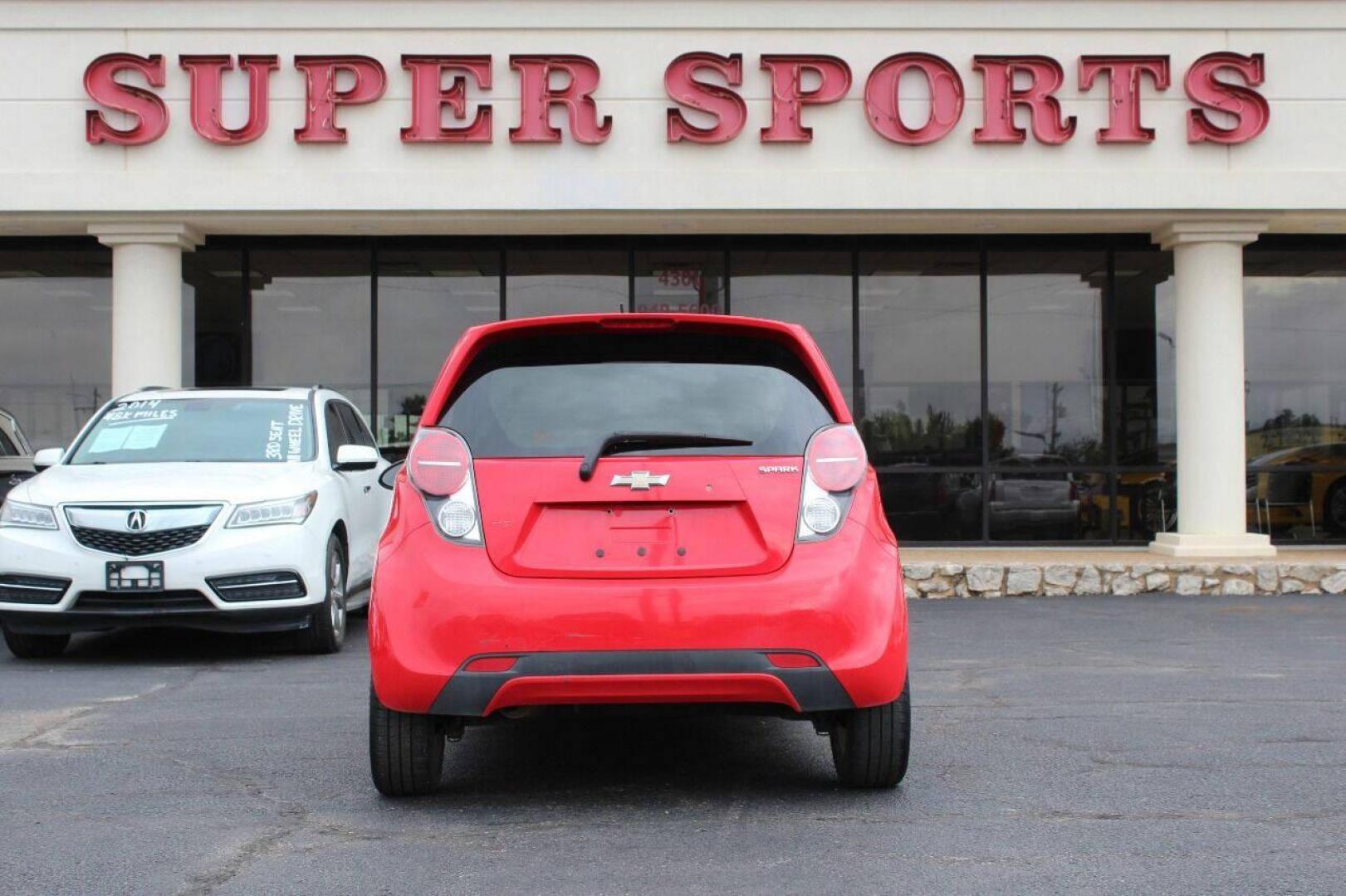 2013 Red Chevrolet Spark LS Manual (KL8CA6S95DC) with an 1.2L L4 16V DOHC engine, 5-Speed Manual transmission, located at 4301 NW 39th , Oklahoma City, OK, 73112, (405) 949-5600, 35.512135, -97.598671 - Photo#4