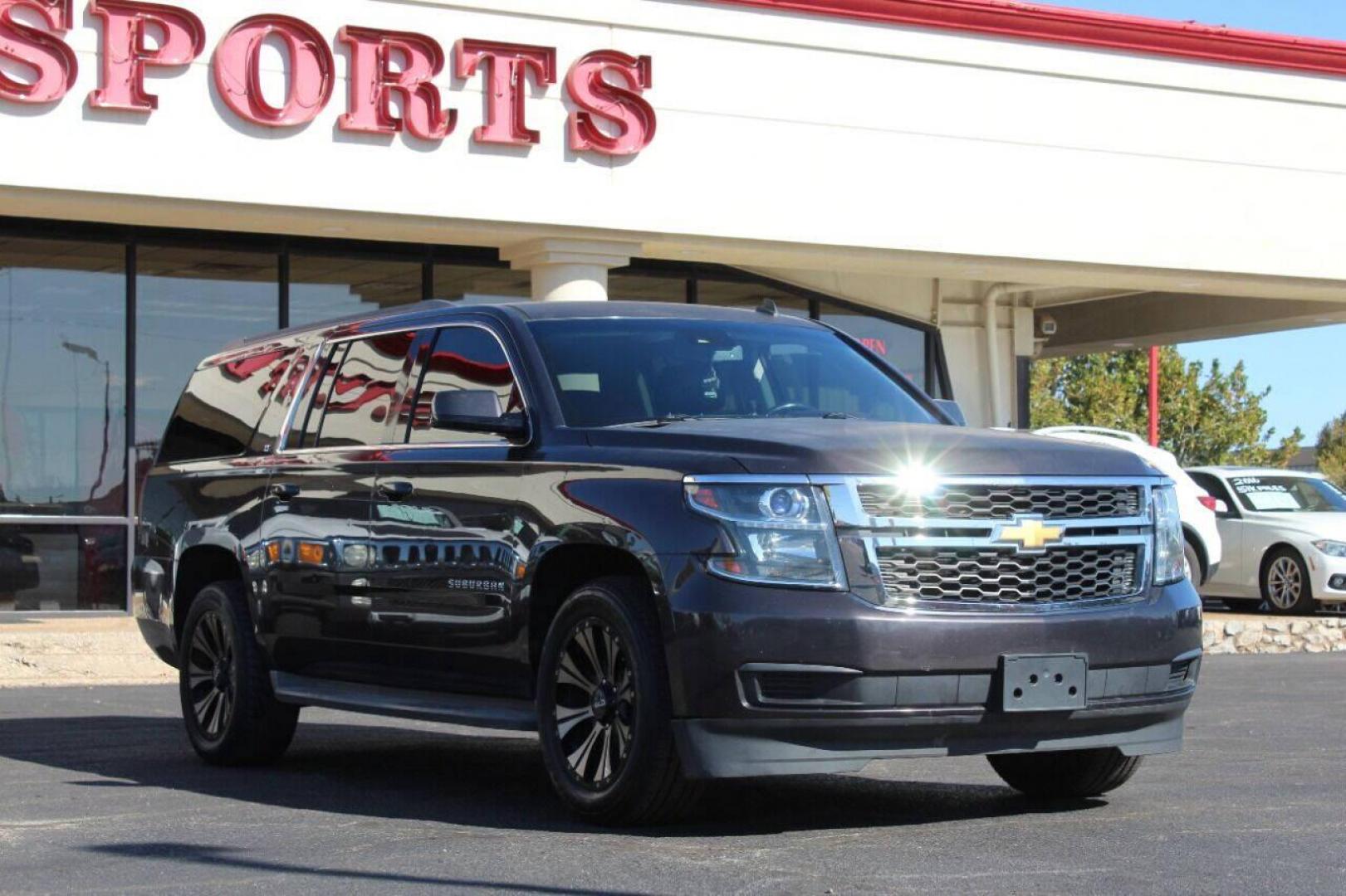 2015 Black Chevrolet Suburban LT 1500 2WD (1GNSCJKC8FR) with an 5.3L V8 OHV 16V engine, 6-Speed Automatic transmission, located at 4301 NW 39th , Oklahoma City, OK, 73112, (405) 949-5600, 35.512135, -97.598671 - NO DRIVERS LICENCE - NO FULL COVERAGE INSURANCE - NO CREDIT CHECK. COME ON OVER TO SUPERSPORTS AND TAKE A LOOK AND TEST DRIVE. PLEASE GIVE US A CALL AT (405) 949-5600. NO LICENCIA DE MANEJAR - NO SEGURO DE COBERTURA TOTAL - NO VERIFICACION DE CREDITO. POR FAVOR VENGAN A SUPERSPORTS, E - Photo#0