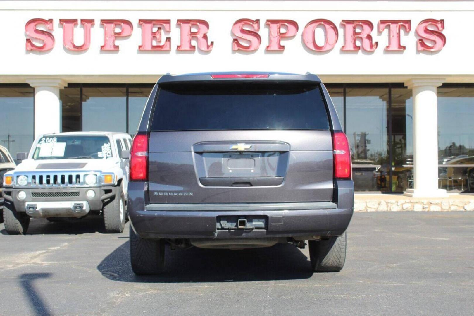 2015 Black Chevrolet Suburban LT 1500 2WD (1GNSCJKC8FR) with an 5.3L V8 OHV 16V engine, 6-Speed Automatic transmission, located at 4301 NW 39th , Oklahoma City, OK, 73112, (405) 949-5600, 35.512135, -97.598671 - NO DRIVERS LICENCE - NO FULL COVERAGE INSURANCE - NO CREDIT CHECK. COME ON OVER TO SUPERSPORTS AND TAKE A LOOK AND TEST DRIVE. PLEASE GIVE US A CALL AT (405) 949-5600. NO LICENCIA DE MANEJAR - NO SEGURO DE COBERTURA TOTAL - NO VERIFICACION DE CREDITO. POR FAVOR VENGAN A SUPERSPORTS, E - Photo#4