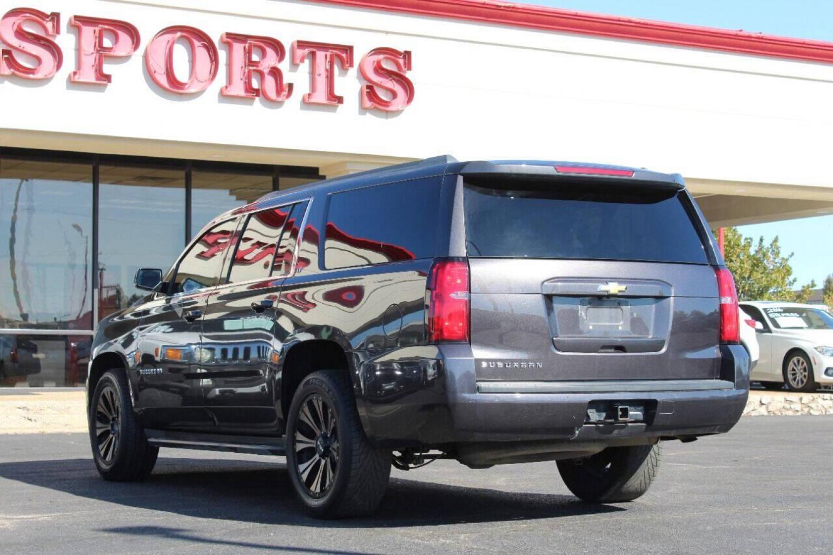 2015 Black Chevrolet Suburban LT 1500 2WD (1GNSCJKC8FR) with an 5.3L V8 OHV 16V engine, 6-Speed Automatic transmission, located at 4301 NW 39th , Oklahoma City, OK, 73112, (405) 949-5600, 35.512135, -97.598671 - NO DRIVERS LICENCE - NO FULL COVERAGE INSURANCE - NO CREDIT CHECK. COME ON OVER TO SUPERSPORTS AND TAKE A LOOK AND TEST DRIVE. PLEASE GIVE US A CALL AT (405) 949-5600. NO LICENCIA DE MANEJAR - NO SEGURO DE COBERTURA TOTAL - NO VERIFICACION DE CREDITO. POR FAVOR VENGAN A SUPERSPORTS, E - Photo#5