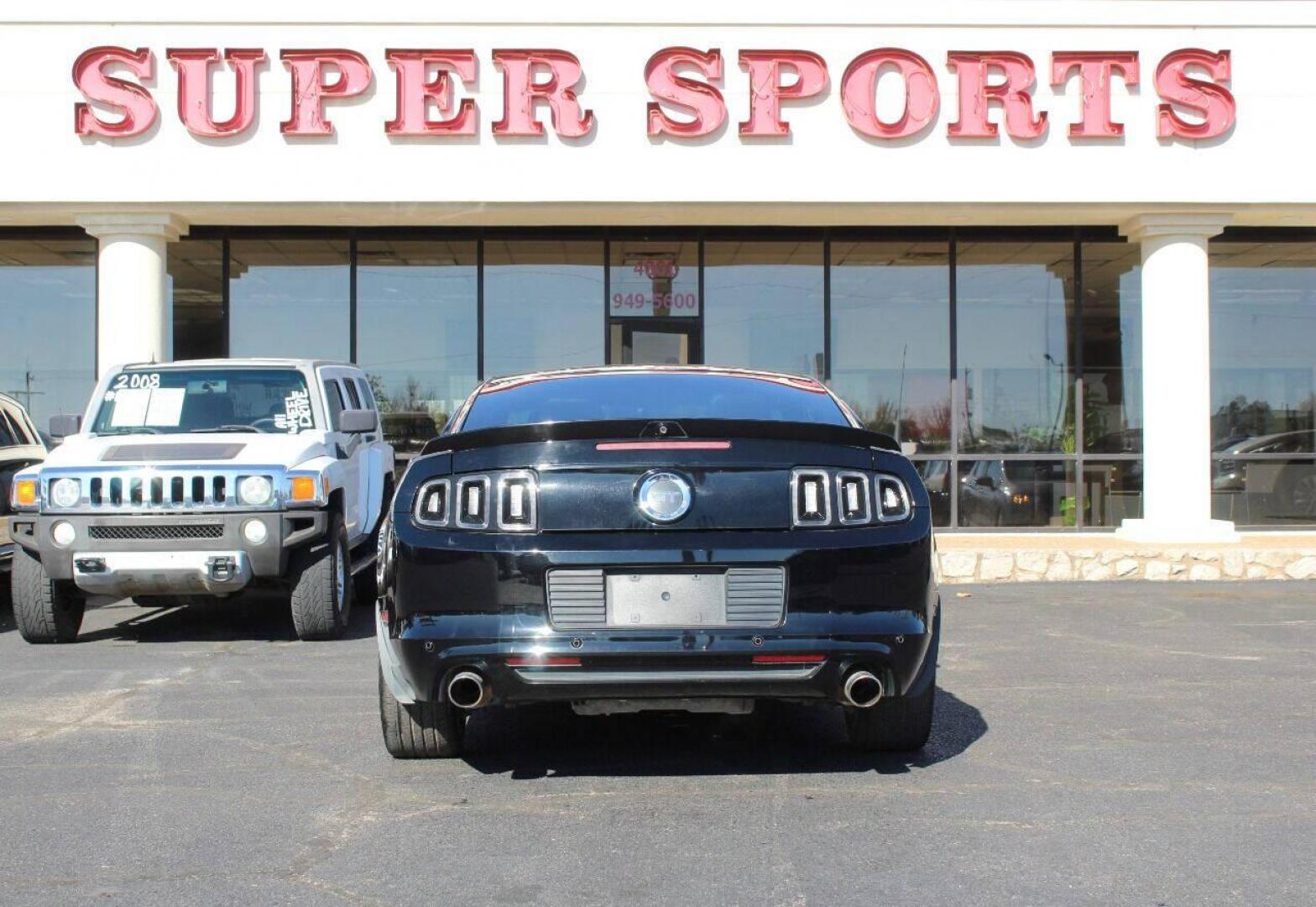 2014 Black Ford Mustang (1ZVBP8CF9E5) with an 5.0L V8 5.0L V8 engine, Automatic 6-Speed transmission, located at 4301 NW 39th , Oklahoma City, OK, 73112, (405) 949-5600, 35.512135, -97.598671 - Photo#4