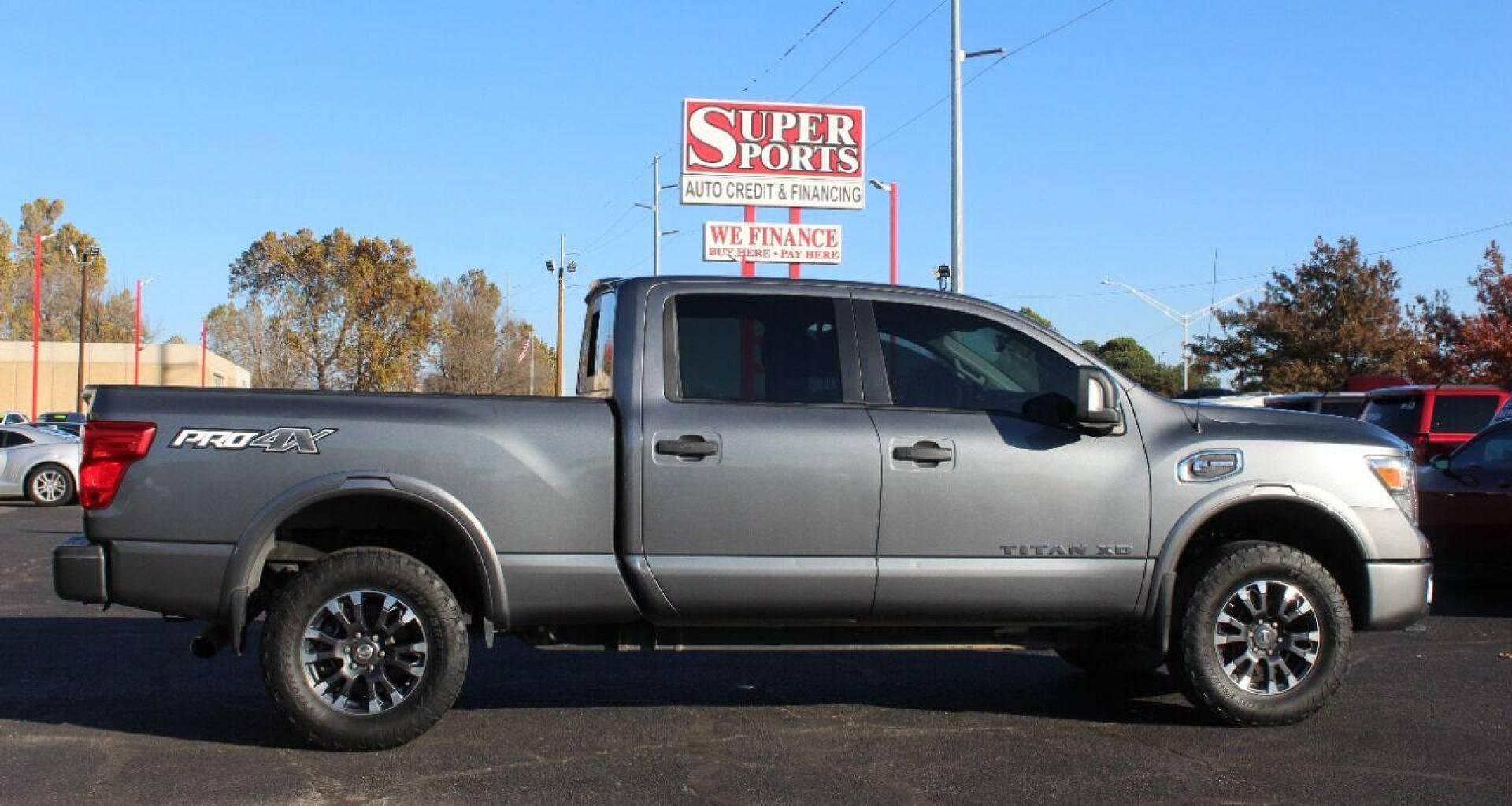 2017 Gray Nissan Titan XD SL 4WD Diesel (1N6BA1F45HN) with an 5.0L V8 DOHC 32V DIESEL engine, 6A transmission, located at 4301 NW 39th , Oklahoma City, OK, 73112, (405) 949-5600, 35.512135, -97.598671 - NO DRIVERS LICENSE - NO FULL COVERAGE INSURANCE - NO CREDIT CHECK. COME ON OVER TO SUPERSPORTS AND TAKE A LOOK AND TEST DRIVE PLEASE GIVE US A CALL AT (405) 949-5600. NO LICENCIA DE MANEJAR - NO SEGURO DE COBERTURA TOTAL - NO VERIFICACION DE CREDITO. POR FAVOR VENGAN A SUPERSPOR - Photo#3