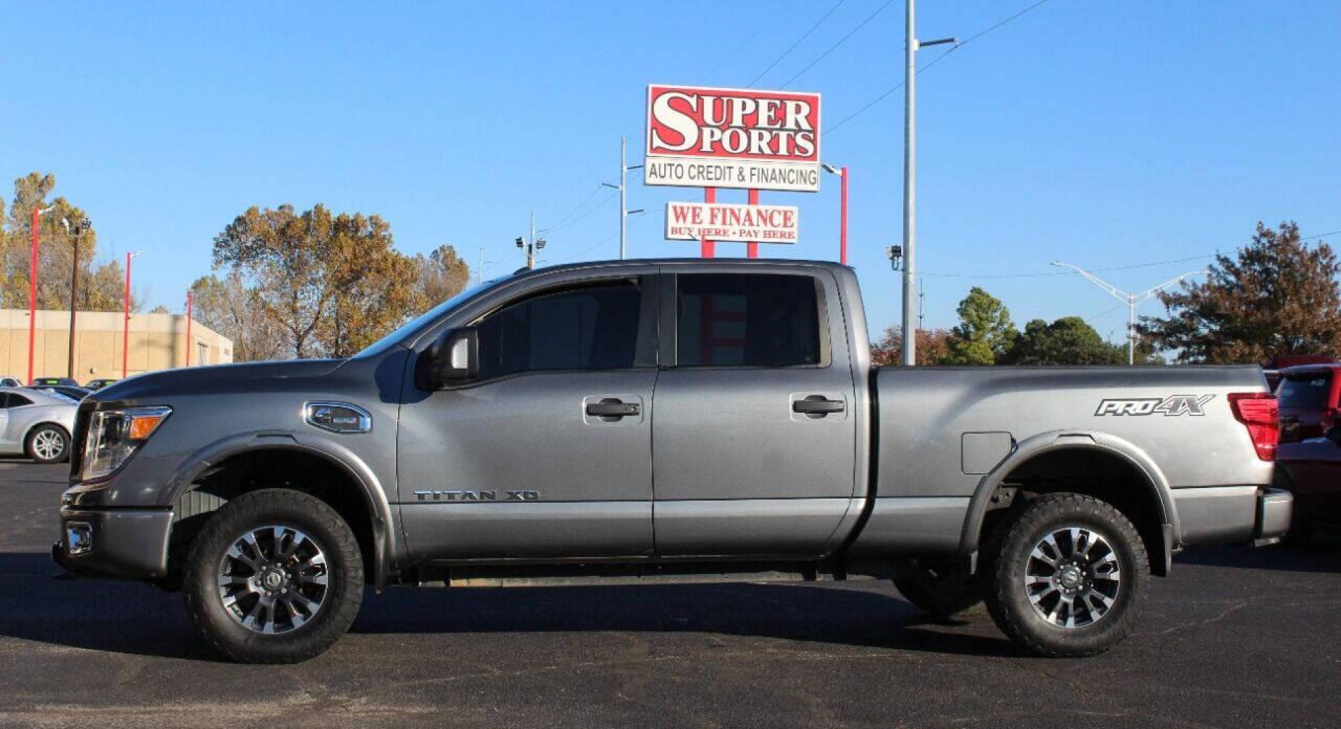 2017 Gray Nissan Titan XD SL 4WD Diesel (1N6BA1F45HN) with an 5.0L V8 DOHC 32V DIESEL engine, 6A transmission, located at 4301 NW 39th , Oklahoma City, OK, 73112, (405) 949-5600, 35.512135, -97.598671 - NO DRIVERS LICENSE - NO FULL COVERAGE INSURANCE - NO CREDIT CHECK. COME ON OVER TO SUPERSPORTS AND TAKE A LOOK AND TEST DRIVE PLEASE GIVE US A CALL AT (405) 949-5600. NO LICENCIA DE MANEJAR - NO SEGURO DE COBERTURA TOTAL - NO VERIFICACION DE CREDITO. POR FAVOR VENGAN A SUPERSPOR - Photo#6