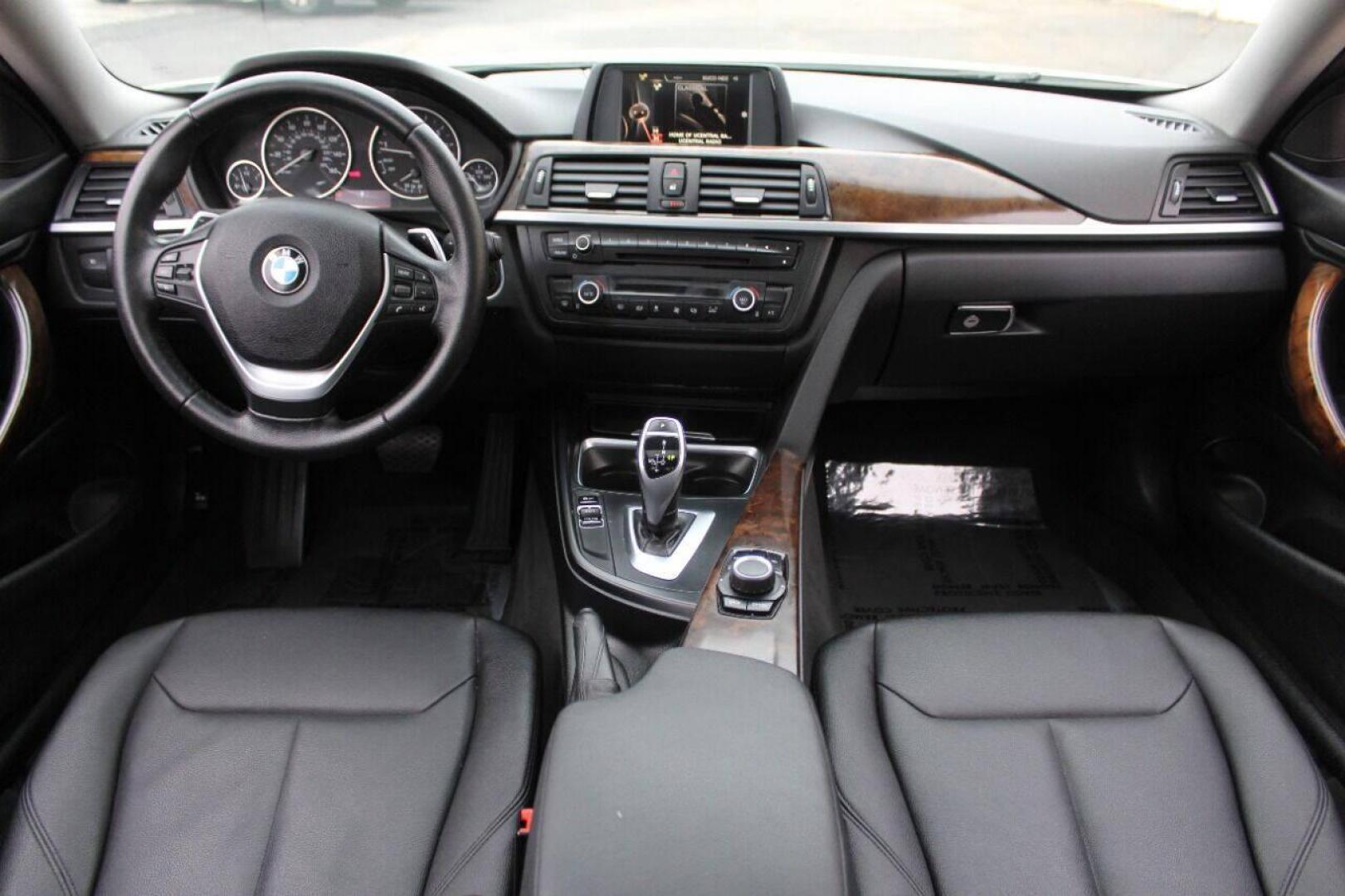 2015 White BMW 4-Series 428i SULEV Coupe (WBA3N7C54FK) with an 2.0L L4 DOHC 16V engine, 8-Speed Automatic transmission, located at 4301 NW 39th , Oklahoma City, OK, 73112, (405) 949-5600, 35.512135, -97.598671 - NO DRIVERS LICENCE NO-FULL COVERAGE INSURANCE-NO CREDIT CHECK. COME ON OVER TO SUPERSPORTS AND TAKE A LOOK AND TEST DRIVE. PLEASE GIVE US A CALL AT (405) 949-5600. NO LICENSIA DE MANEJAR- NO SEGURO DE COBERTURA TOTAL- NO VERIFICACCION DE CREDITO. POR FAVOR VENGAN A SUPERSPORTS, ECHE UN - Photo#14