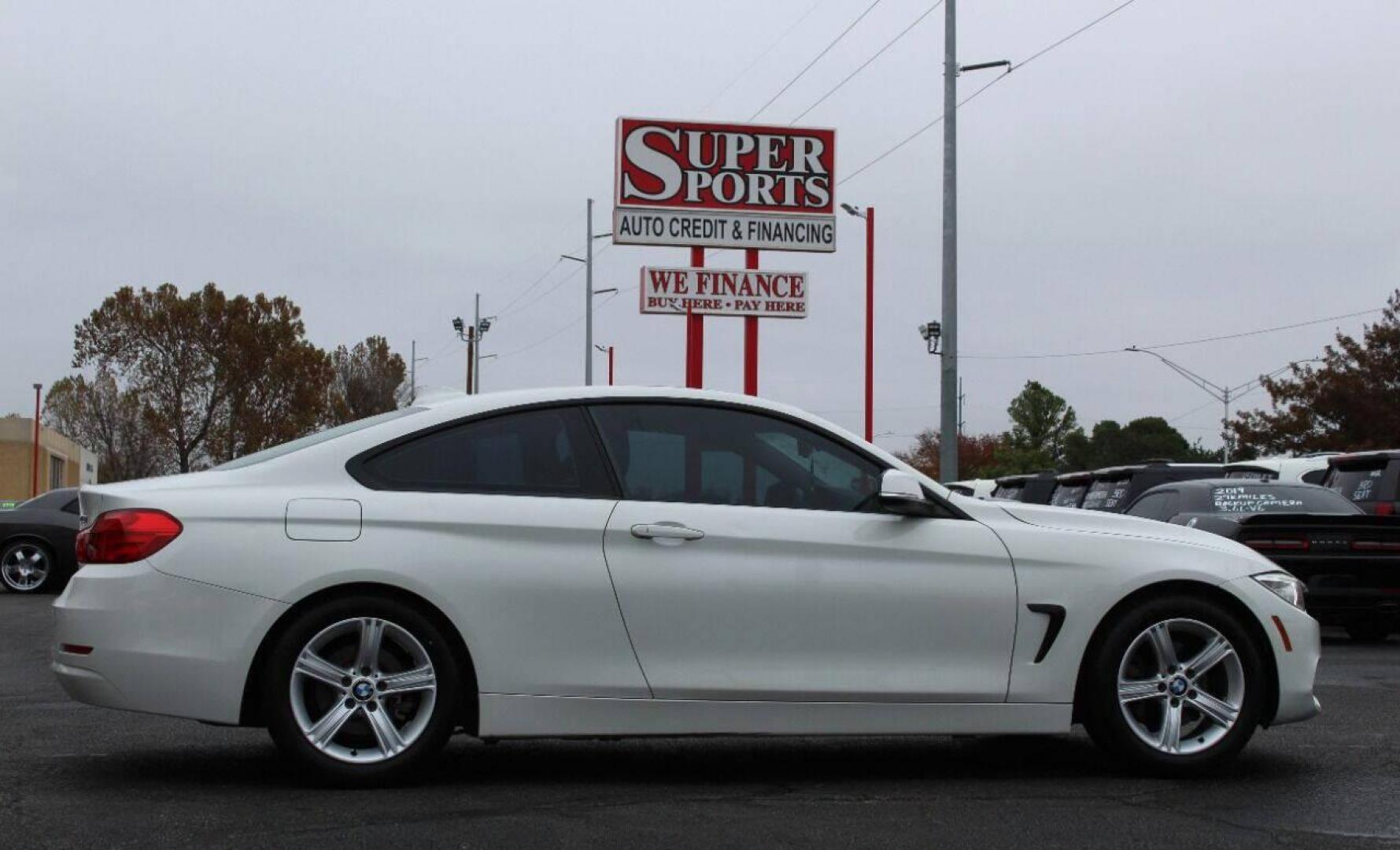 2015 White BMW 4-Series 428i SULEV Coupe (WBA3N7C54FK) with an 2.0L L4 DOHC 16V engine, 8-Speed Automatic transmission, located at 4301 NW 39th , Oklahoma City, OK, 73112, (405) 949-5600, 35.512135, -97.598671 - NO DRIVERS LICENCE NO-FULL COVERAGE INSURANCE-NO CREDIT CHECK. COME ON OVER TO SUPERSPORTS AND TAKE A LOOK AND TEST DRIVE. PLEASE GIVE US A CALL AT (405) 949-5600. NO LICENSIA DE MANEJAR- NO SEGURO DE COBERTURA TOTAL- NO VERIFICACCION DE CREDITO. POR FAVOR VENGAN A SUPERSPORTS, ECHE UN - Photo#3