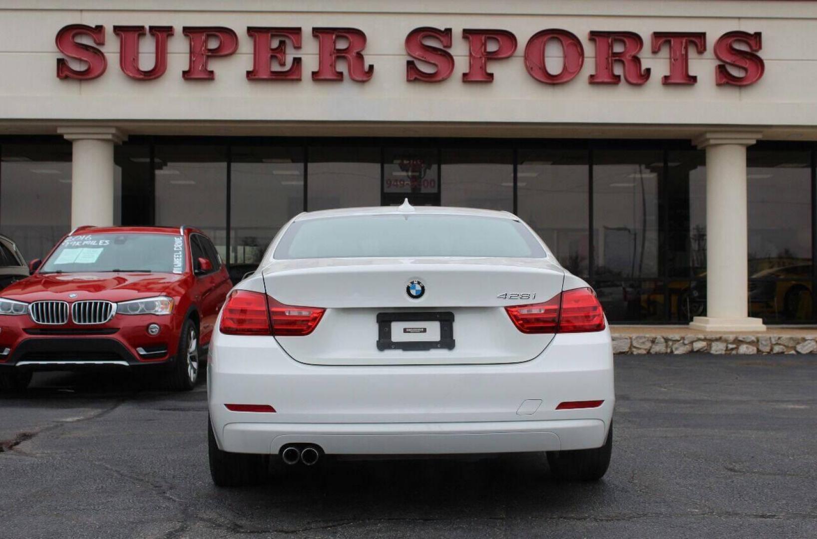 2015 White BMW 4-Series 428i SULEV Coupe (WBA3N7C54FK) with an 2.0L L4 DOHC 16V engine, 8-Speed Automatic transmission, located at 4301 NW 39th , Oklahoma City, OK, 73112, (405) 949-5600, 35.512135, -97.598671 - NO DRIVERS LICENCE NO-FULL COVERAGE INSURANCE-NO CREDIT CHECK. COME ON OVER TO SUPERSPORTS AND TAKE A LOOK AND TEST DRIVE. PLEASE GIVE US A CALL AT (405) 949-5600. NO LICENSIA DE MANEJAR- NO SEGURO DE COBERTURA TOTAL- NO VERIFICACCION DE CREDITO. POR FAVOR VENGAN A SUPERSPORTS, ECHE UN - Photo#4