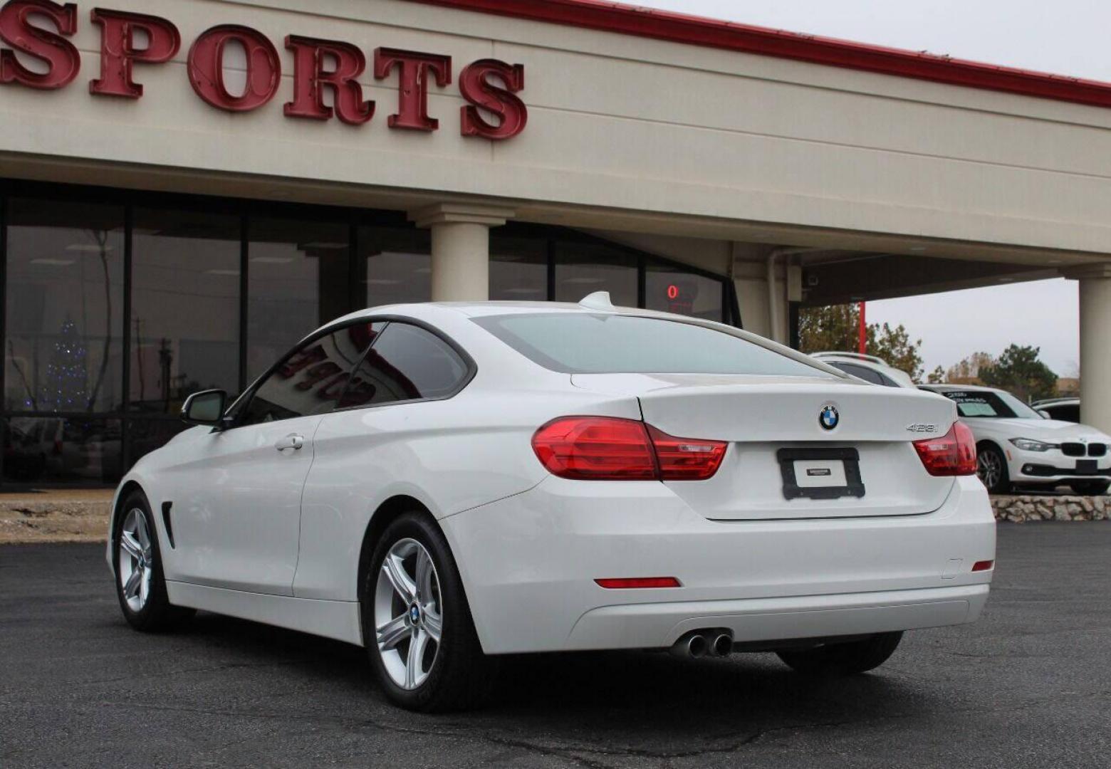 2015 White BMW 4-Series 428i SULEV Coupe (WBA3N7C54FK) with an 2.0L L4 DOHC 16V engine, 8-Speed Automatic transmission, located at 4301 NW 39th , Oklahoma City, OK, 73112, (405) 949-5600, 35.512135, -97.598671 - NO DRIVERS LICENCE NO-FULL COVERAGE INSURANCE-NO CREDIT CHECK. COME ON OVER TO SUPERSPORTS AND TAKE A LOOK AND TEST DRIVE. PLEASE GIVE US A CALL AT (405) 949-5600. NO LICENSIA DE MANEJAR- NO SEGURO DE COBERTURA TOTAL- NO VERIFICACCION DE CREDITO. POR FAVOR VENGAN A SUPERSPORTS, ECHE UN - Photo#5