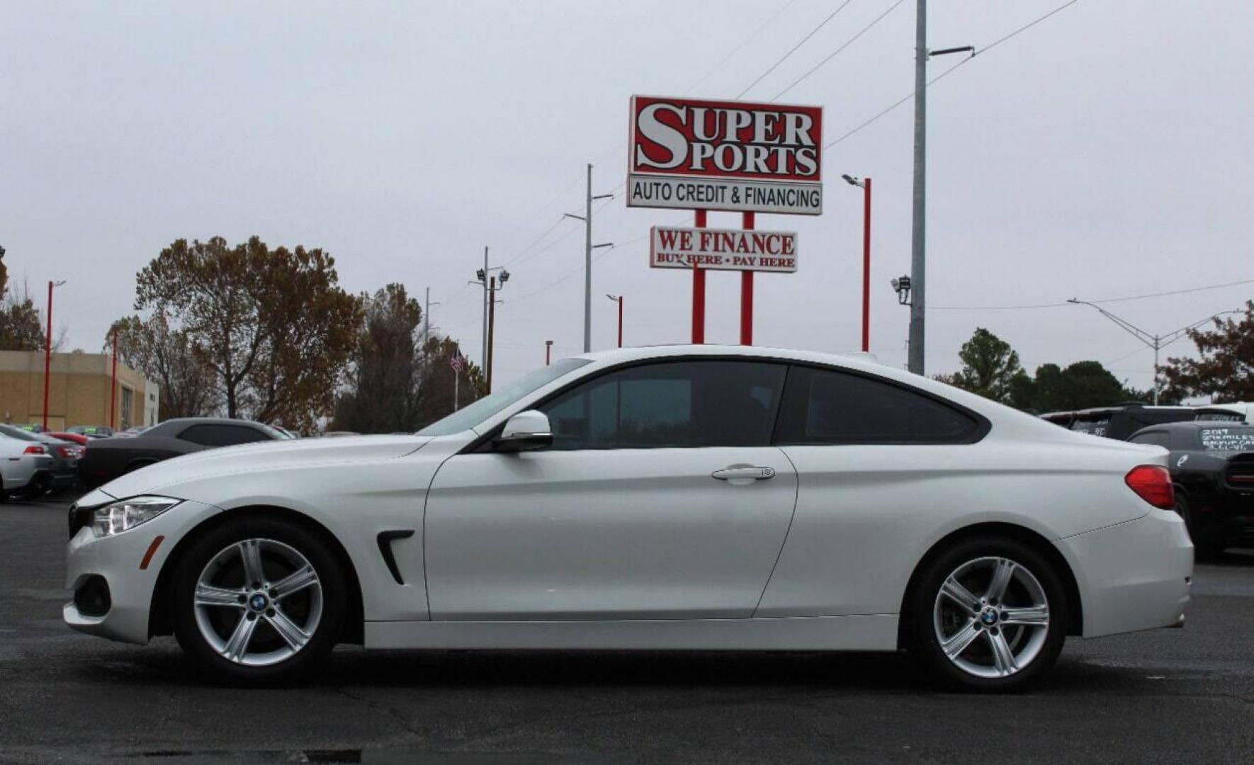 2015 White BMW 4-Series 428i SULEV Coupe (WBA3N7C54FK) with an 2.0L L4 DOHC 16V engine, 8-Speed Automatic transmission, located at 4301 NW 39th , Oklahoma City, OK, 73112, (405) 949-5600, 35.512135, -97.598671 - NO DRIVERS LICENCE NO-FULL COVERAGE INSURANCE-NO CREDIT CHECK. COME ON OVER TO SUPERSPORTS AND TAKE A LOOK AND TEST DRIVE. PLEASE GIVE US A CALL AT (405) 949-5600. NO LICENSIA DE MANEJAR- NO SEGURO DE COBERTURA TOTAL- NO VERIFICACCION DE CREDITO. POR FAVOR VENGAN A SUPERSPORTS, ECHE UN - Photo#6