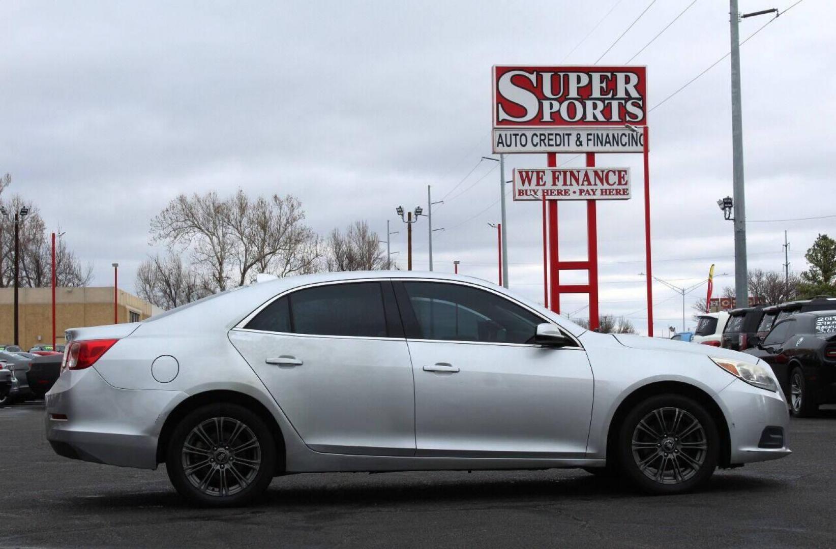 2013 Silver Chevrolet Malibu (1G11D5RR3DF) with an 2.4L I4 2.4L I4 engine, Automatic 6-Speed transmission, located at 4301 NW 39th , Oklahoma City, OK, 73112, (405) 949-5600, 35.512135, -97.598671 - THIS IS A CASH ONLY VEHICLE AND IS NOT ELIGIBLE FOR FINANCING NO DRIVERS LICENCE -0 NO FULL COVERAGE INSURANCE - NO CREDIT CHECK. COME ON OVER TO SUPERSPORTS AND TAKE A LOOK AND TEST DRIVE PLEASE GIVE US A CALL AT (405) 949-5600. NO LICENCIA DE MANEJAR - NO SEGURO DE COBERTURA TOTAL - Photo#3