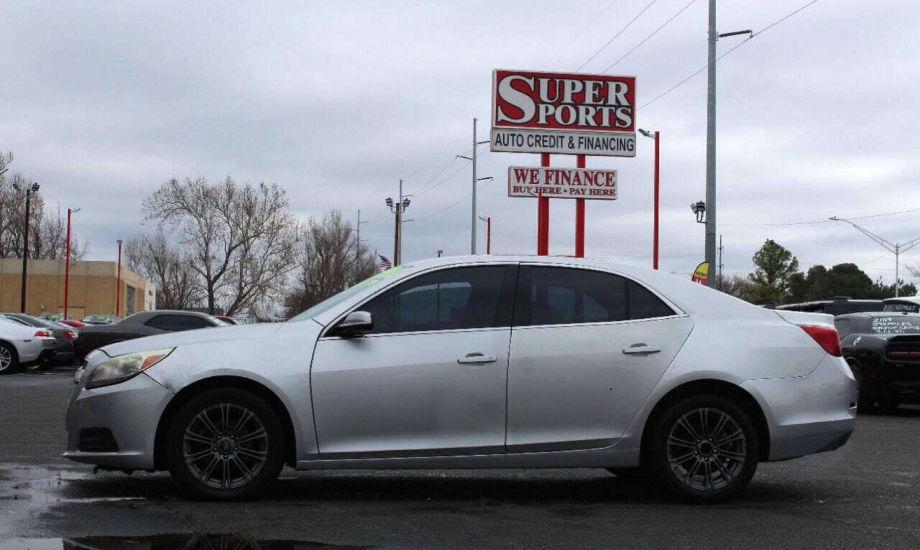 2013 Silver Chevrolet Malibu (1G11D5RR3DF) with an 2.4L I4 2.4L I4 engine, Automatic 6-Speed transmission, located at 4301 NW 39th , Oklahoma City, OK, 73112, (405) 949-5600, 35.512135, -97.598671 - THIS IS A CASH ONLY VEHICLE AND IS NOT ELIGIBLE FOR FINANCING NO DRIVERS LICENCE -0 NO FULL COVERAGE INSURANCE - NO CREDIT CHECK. COME ON OVER TO SUPERSPORTS AND TAKE A LOOK AND TEST DRIVE PLEASE GIVE US A CALL AT (405) 949-5600. NO LICENCIA DE MANEJAR - NO SEGURO DE COBERTURA TOTAL - Photo#6