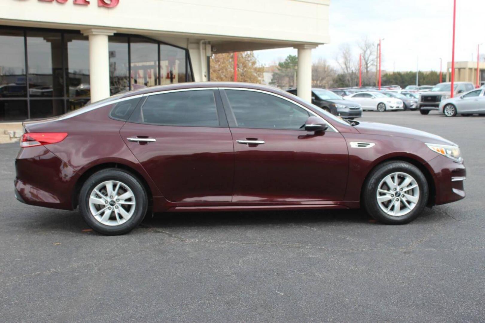 2017 Burgundy Kia Optima LX (5XXGT4L39HG) with an 2.4L L4 DOHC 16V engine, 6A transmission, located at 4301 NW 39th , Oklahoma City, OK, 73112, (405) 949-5600, 35.512135, -97.598671 - NO DRIVERS LICENCE NO-FULL COVERAGE INSURANCE-NO CREDIT CHECK. COME ON OVER TO SUPERSPORTS AND TAKE A LOOK AND TEST DRIVE. PLEASE GIVE US A CALL AT (405) 949-5600. NO LICENSIA DE MANEJAR- NO SEGURO DE COBERTURA TOTAL- NO VERIFICACCION DE CREDITO. POR FAVOR VENGAN A SUPERSPORTS, ECHE UN - Photo#2