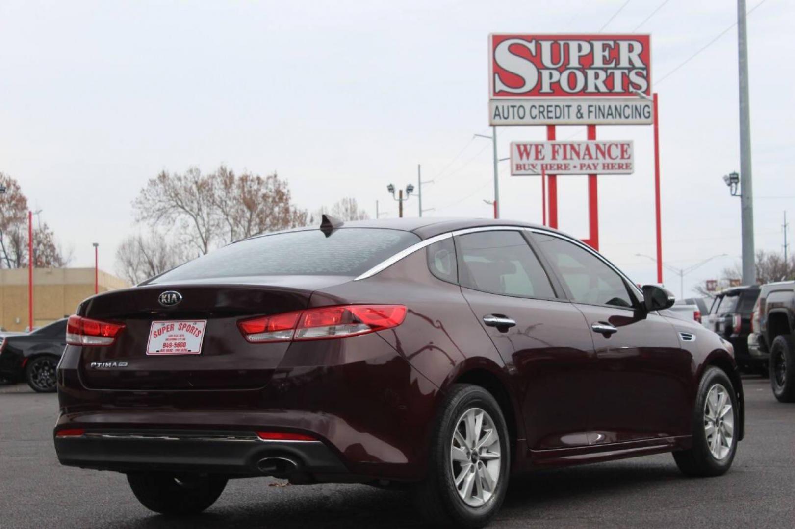 2017 Burgundy Kia Optima LX (5XXGT4L39HG) with an 2.4L L4 DOHC 16V engine, 6A transmission, located at 4301 NW 39th , Oklahoma City, OK, 73112, (405) 949-5600, 35.512135, -97.598671 - NO DRIVERS LICENCE NO-FULL COVERAGE INSURANCE-NO CREDIT CHECK. COME ON OVER TO SUPERSPORTS AND TAKE A LOOK AND TEST DRIVE. PLEASE GIVE US A CALL AT (405) 949-5600. NO LICENSIA DE MANEJAR- NO SEGURO DE COBERTURA TOTAL- NO VERIFICACCION DE CREDITO. POR FAVOR VENGAN A SUPERSPORTS, ECHE UN - Photo#3