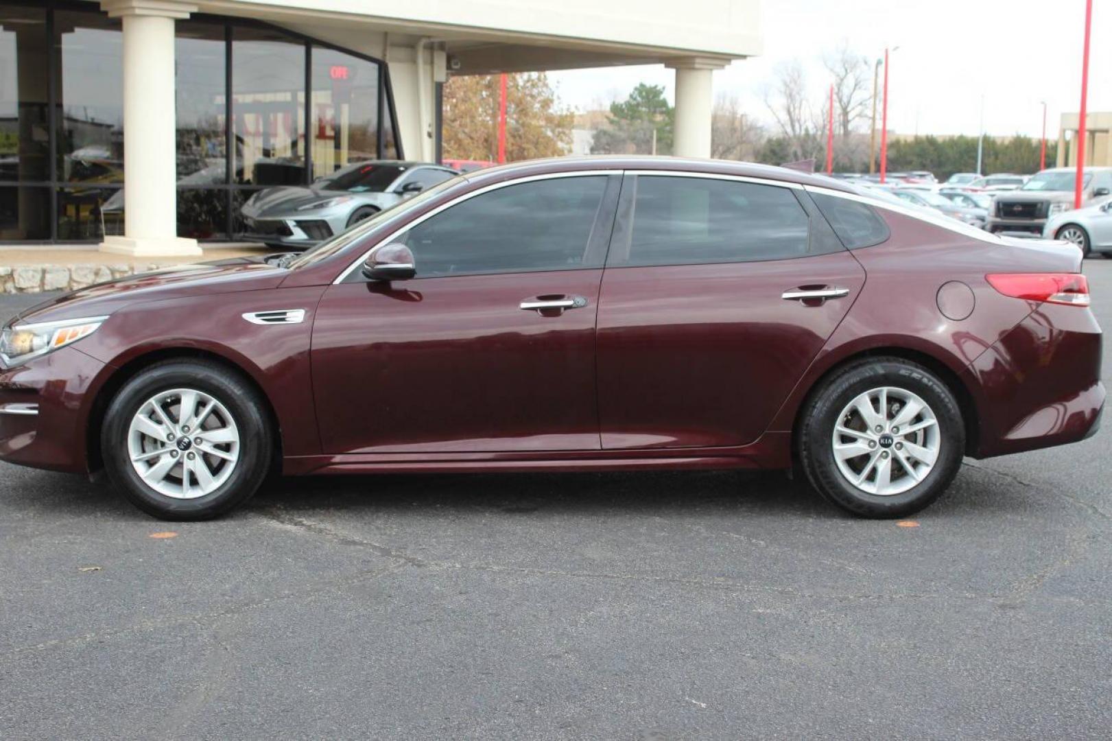 2017 Burgundy Kia Optima LX (5XXGT4L39HG) with an 2.4L L4 DOHC 16V engine, 6A transmission, located at 4301 NW 39th , Oklahoma City, OK, 73112, (405) 949-5600, 35.512135, -97.598671 - NO DRIVERS LICENCE NO-FULL COVERAGE INSURANCE-NO CREDIT CHECK. COME ON OVER TO SUPERSPORTS AND TAKE A LOOK AND TEST DRIVE. PLEASE GIVE US A CALL AT (405) 949-5600. NO LICENSIA DE MANEJAR- NO SEGURO DE COBERTURA TOTAL- NO VERIFICACCION DE CREDITO. POR FAVOR VENGAN A SUPERSPORTS, ECHE UN - Photo#5